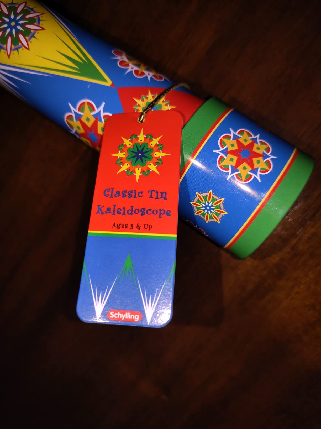 Schylling Classic Tin Kaleidoscope - Fun, Colorful Pattern-Changing Toy - Durable Tin with Multicolored Beads - Ages 3 and Up - One Piece Customer Review Schylling Classic Tin Kaleidoscope - Fun, Colorful Pattern-Changing Toy - Durable Tin with Multicolored Beads - Ages 3 and Up - One Piece - Customer Photo 1