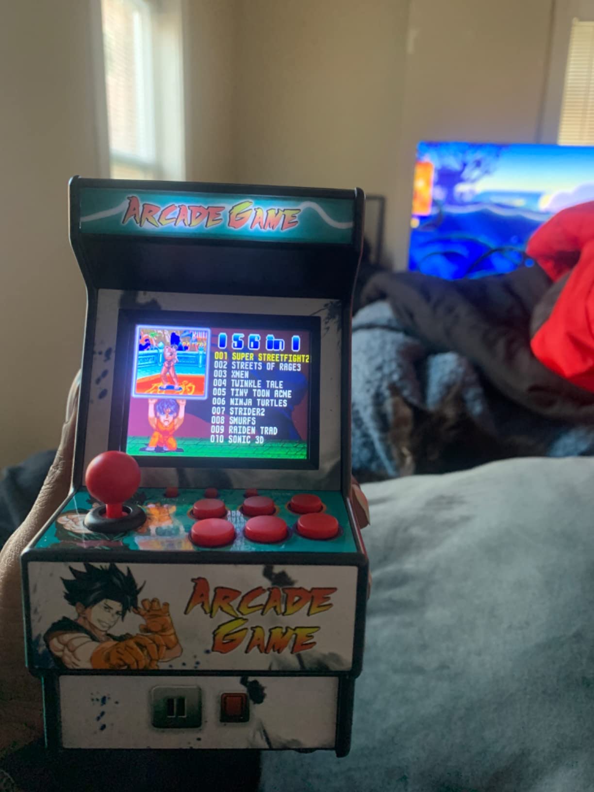 Mini Arcade Machine, Retro Gaming Console, Handheld Game Console with 156 Classic 16-Bit Video Games, 2.8 Inch Color Display, Rechargeable Battery, Support for TV Output, Birthday Present for Children - Customer Photo 2