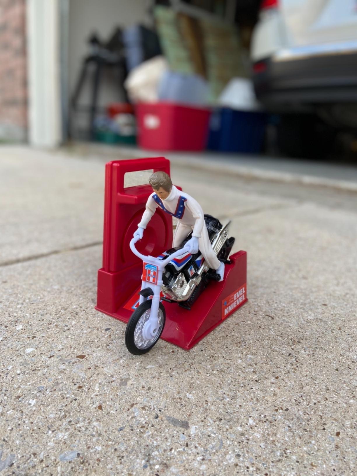 Evel Knievel Stunt Cycle - The Amazing Wind Up and Go Action Toy Launcher for Ultimate Jumps, Crashes, Flips and More - 8 Inch Bike Jumps Anywhere from 100 to 150 Feet - Original 1970's Stunt Bike. Customer Review Evel Knievel Stunt Cycle - The Amazing Wind Up and Go Action Toy Launcher for Ultimate Jumps, Crashes, Flips and More - 8 Inch Bike Jumps Anywhere from 100 to 150 Feet - Original 1970's Stunt Bike. - Customer Photo 2