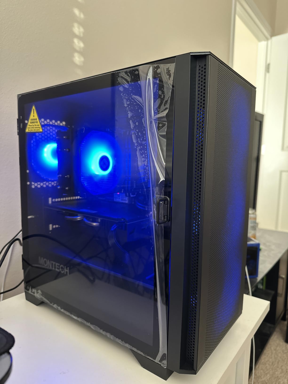 Montech AIR 100 ARGB Micro-ATX Tower with Four ARGB Fans Pre Installed, Ultra-Minimalist Design, Fine Mesh Front Panel, High Airflow, Unique Side Swivel Tempered Glass, Black - Customer Photo 1