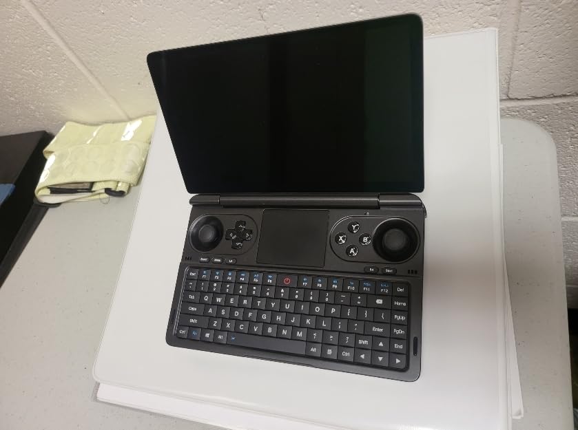 GPD Win Mini Handheld Gaming PC. Unleash Power on-The-go with AMD Ryzen 7 7840U CPU, Radeon 780M Graphics, 64GB RAM, 2TB Storage, Oculink Support, Portable Clamshell Design, QWERTY Keyboard - Customer Photo 2