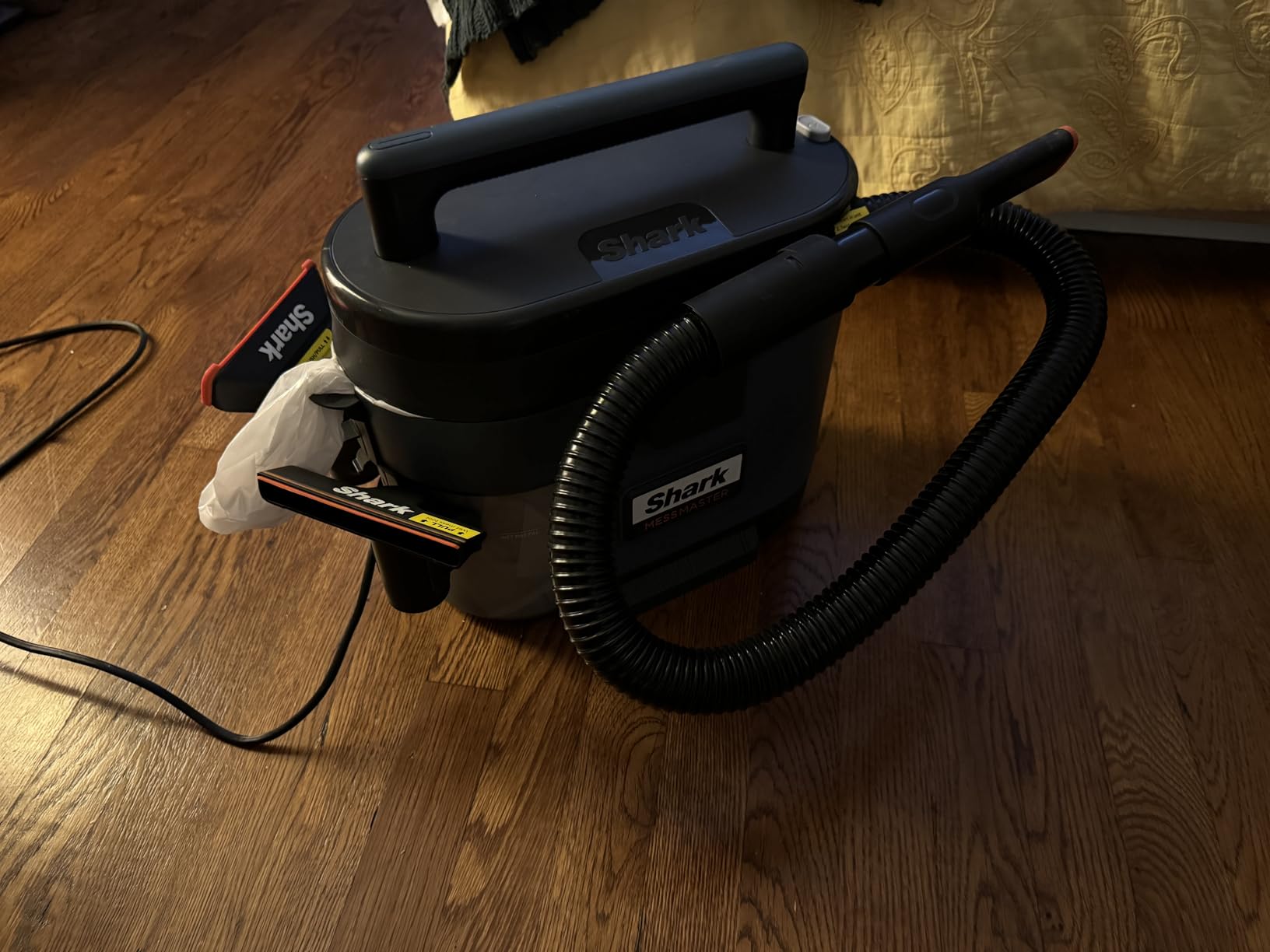 Shark MessMaster Portable Wet Dry Vacuum, 1 Gallon Capacity, True Grip Accessory Suite, Corded, Perfect for Pets & Cars, Ultra-Powerful Suction for Tough Wet & Dry Messes, Burgundy, UV105 - Customer Photo 2