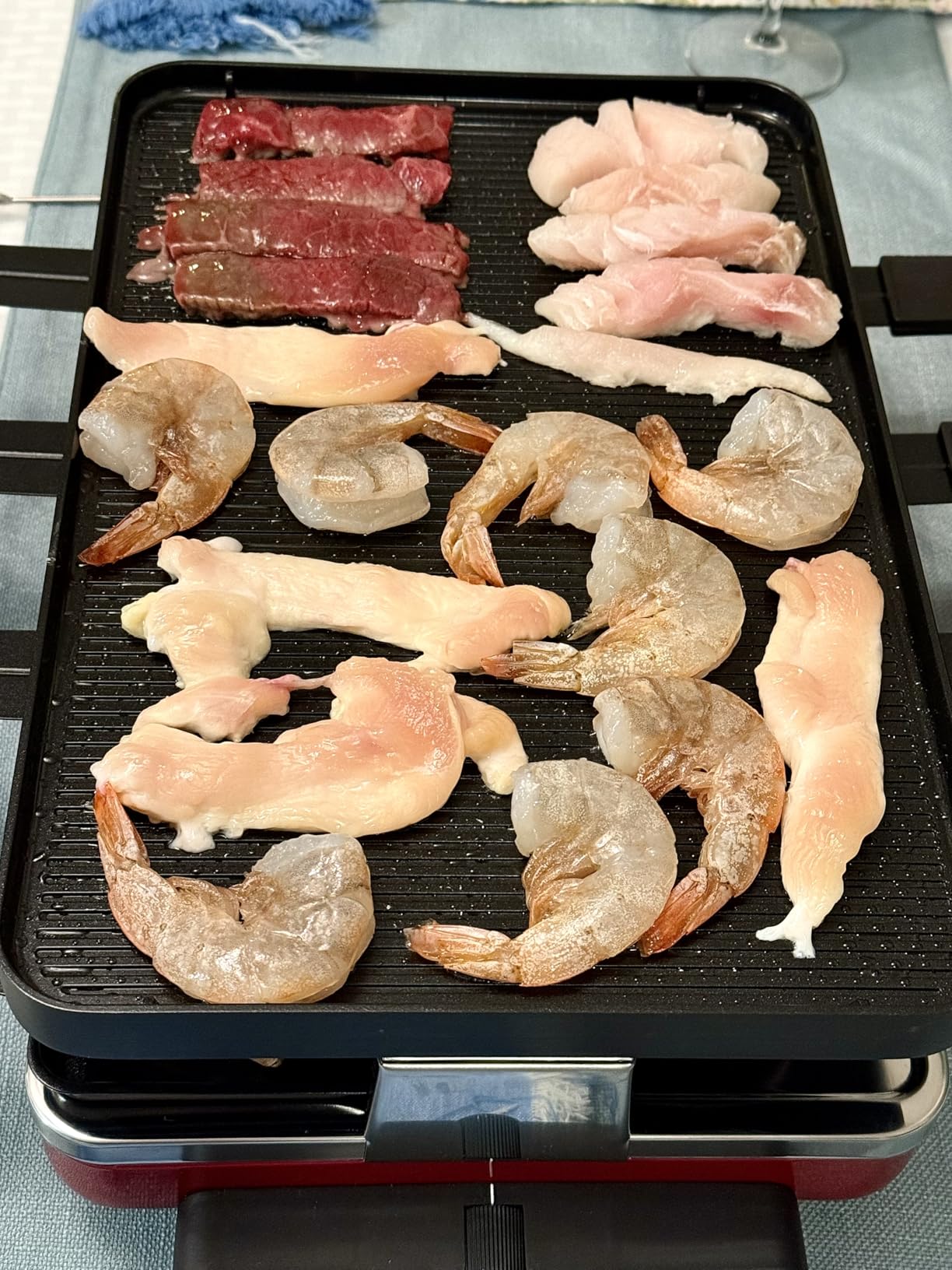 Swissmar Classic 8-Person Raclette Party Grill with Reversible Cast Iron Grill Plate/Crepe Top, Indoor Electric Raclette Grill & Griller - Red customer photo 2