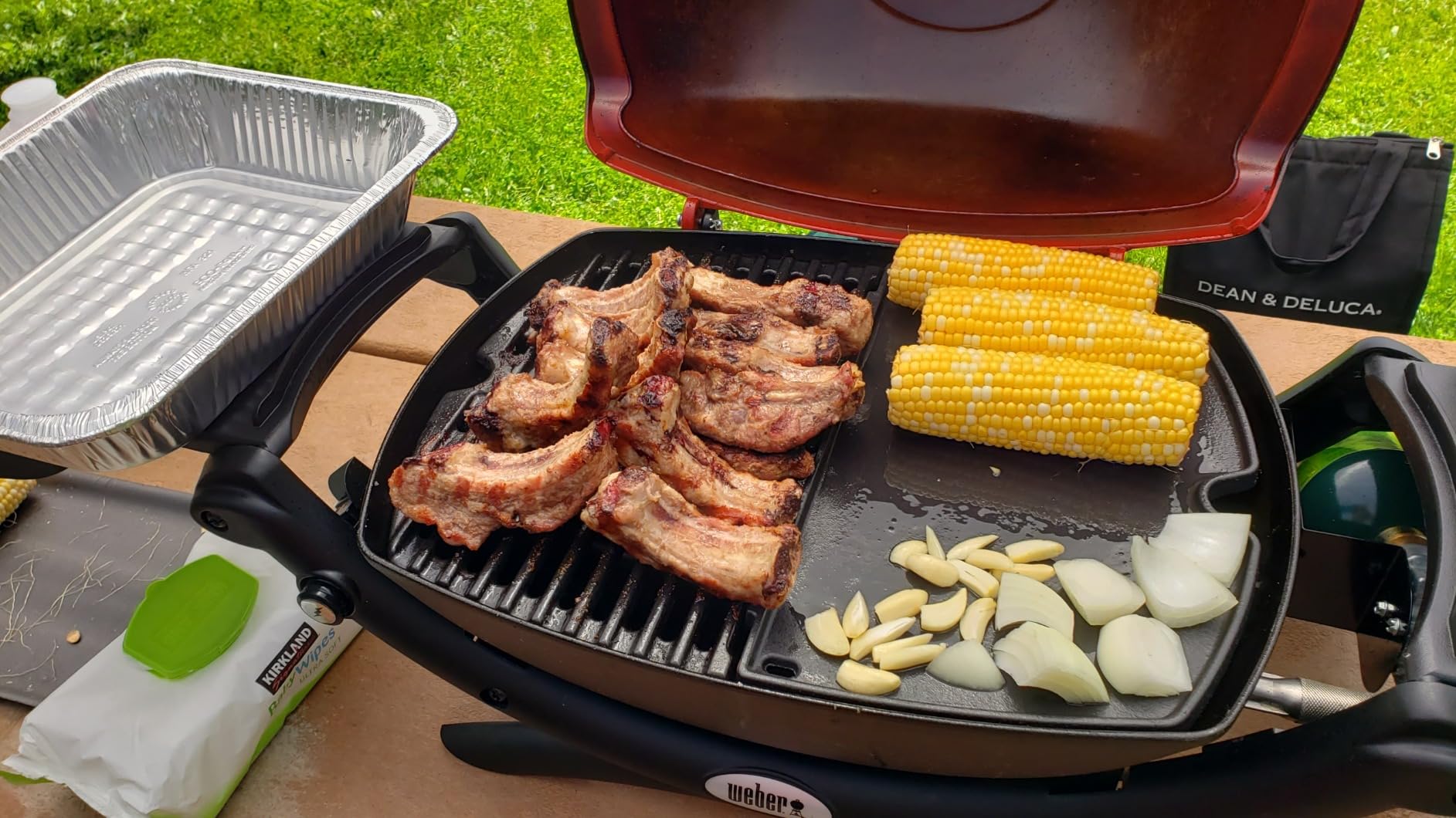 Weber Q1200 Liquid Propane Portable Gas Grill, Titanium - 1-Burner Travel and Camping Grill with Cast-Iron Grates & Electronic Ignition (8,500 BTU Burner) customer photo 2