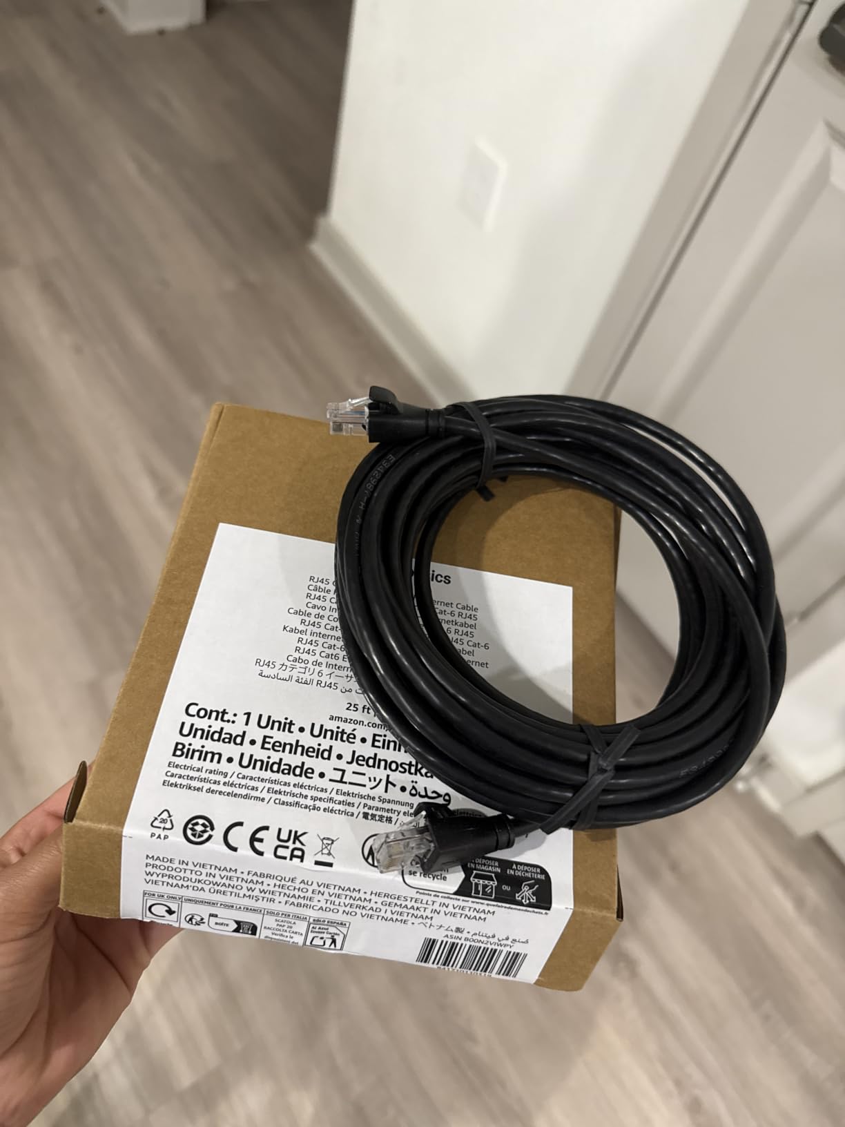 Amazon Basics RJ45 Cat-6 Ethernet Network Cable for Fast Gaming, 1Gbps Transfer Speed, Gigabit Ethernet, Gold-Plated Connectors, Router Modem Switch, 25 ft/7.6m, Black customer photo 1