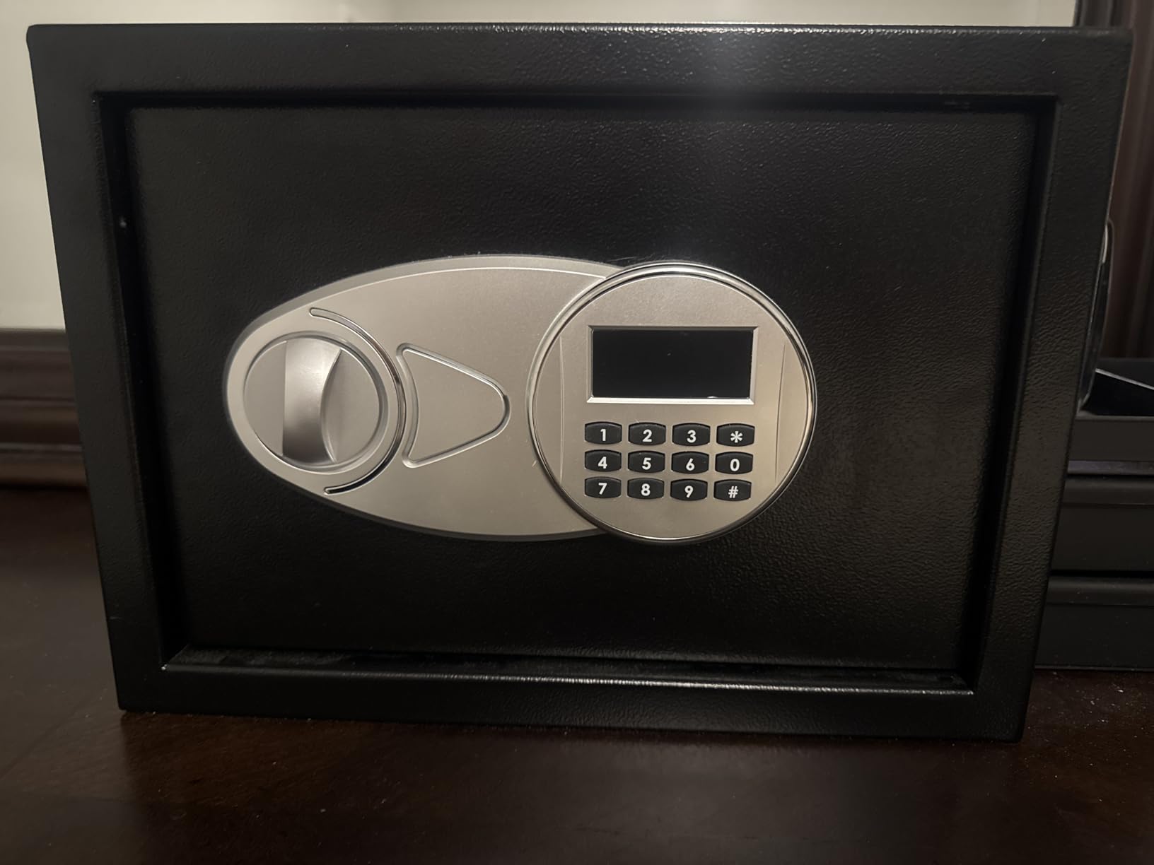 Amazon Basics Steel Security Safe and Lock Box with Digital Keypad, Electronic Lock, Emergency Key Open, Secure Cash, Jewelry, Documents, Black, 0.7 Cubic Feet, 16.9-x-14.6-x-7.1-inches (WxDxH) customer photo 2