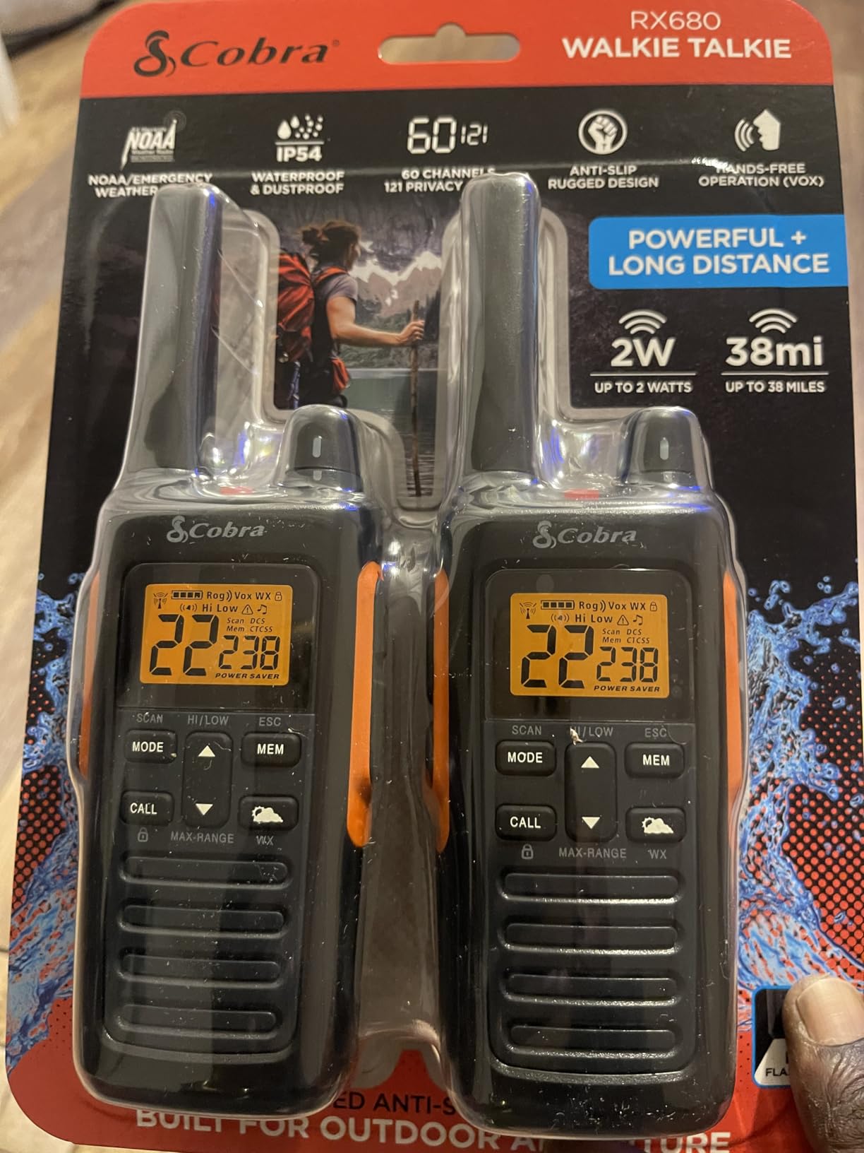 Cobra RX680 Walkie Talkies (2-Pack) - Rugged & Splashproof Two Way Radios Long Range, IP54 Water Resistant Design, 60 Pre-Programmed Channels, Weather Alerts, Included Charging Dock (Black/Orange) customer photo 1
