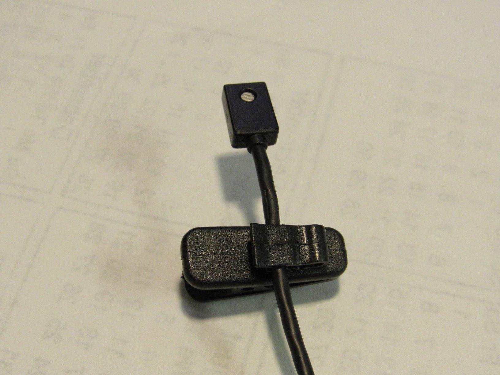 FENGWANGLI Headphone Clip for Shirt, 1 Inch Length Small Earbud Cord Management Earphone Mount Cable Clothing Clip to Keep Microphone Cord in Place for 1.5mm Diameter Round Wire (12 Pcs/Black) customer photo 1