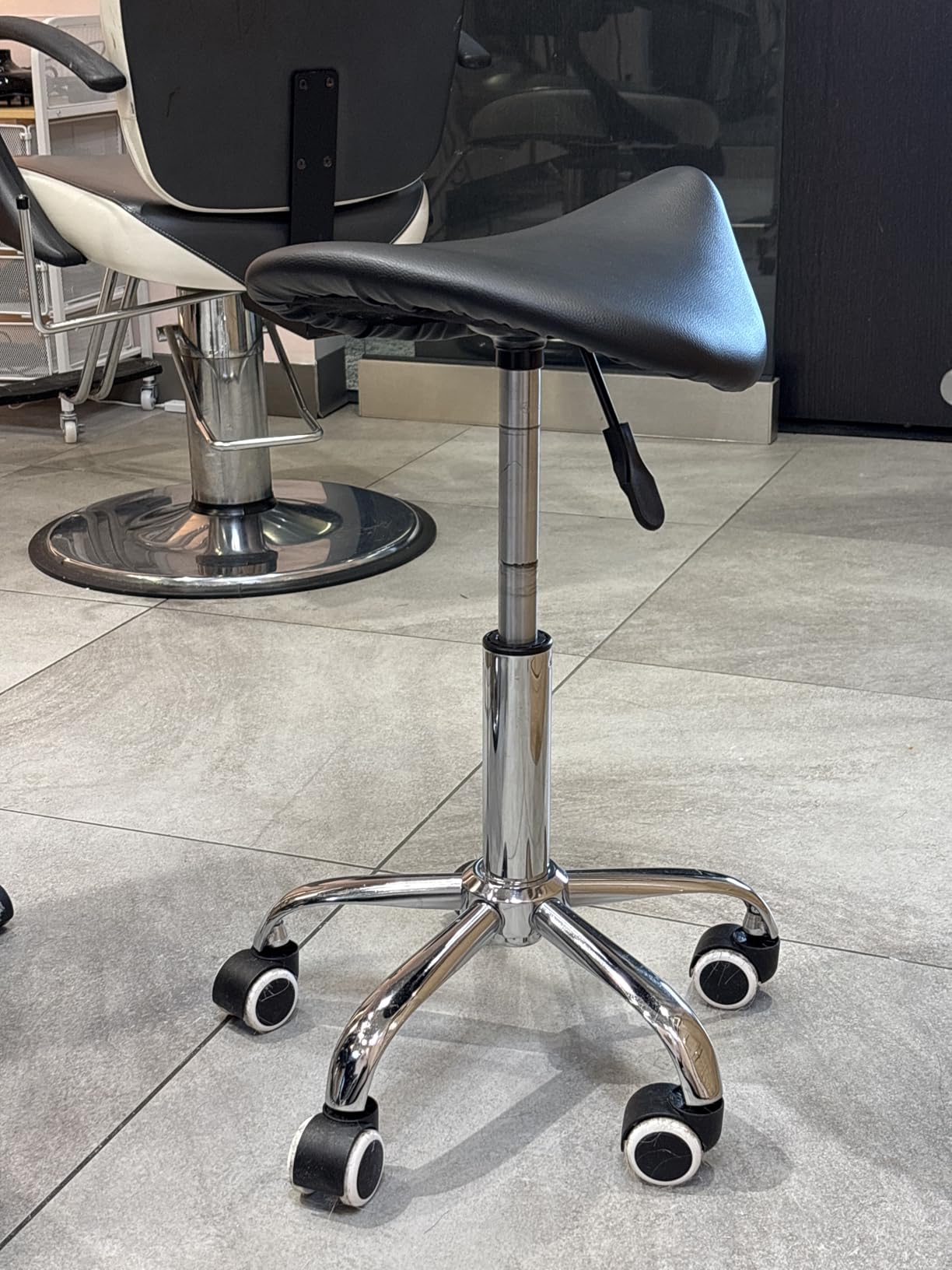 KKTONER Rolling Saddle Stool PU Leather Swivel Adjustable Rolling Stool with Wheels Salon Chair (Pink) customer photo 1