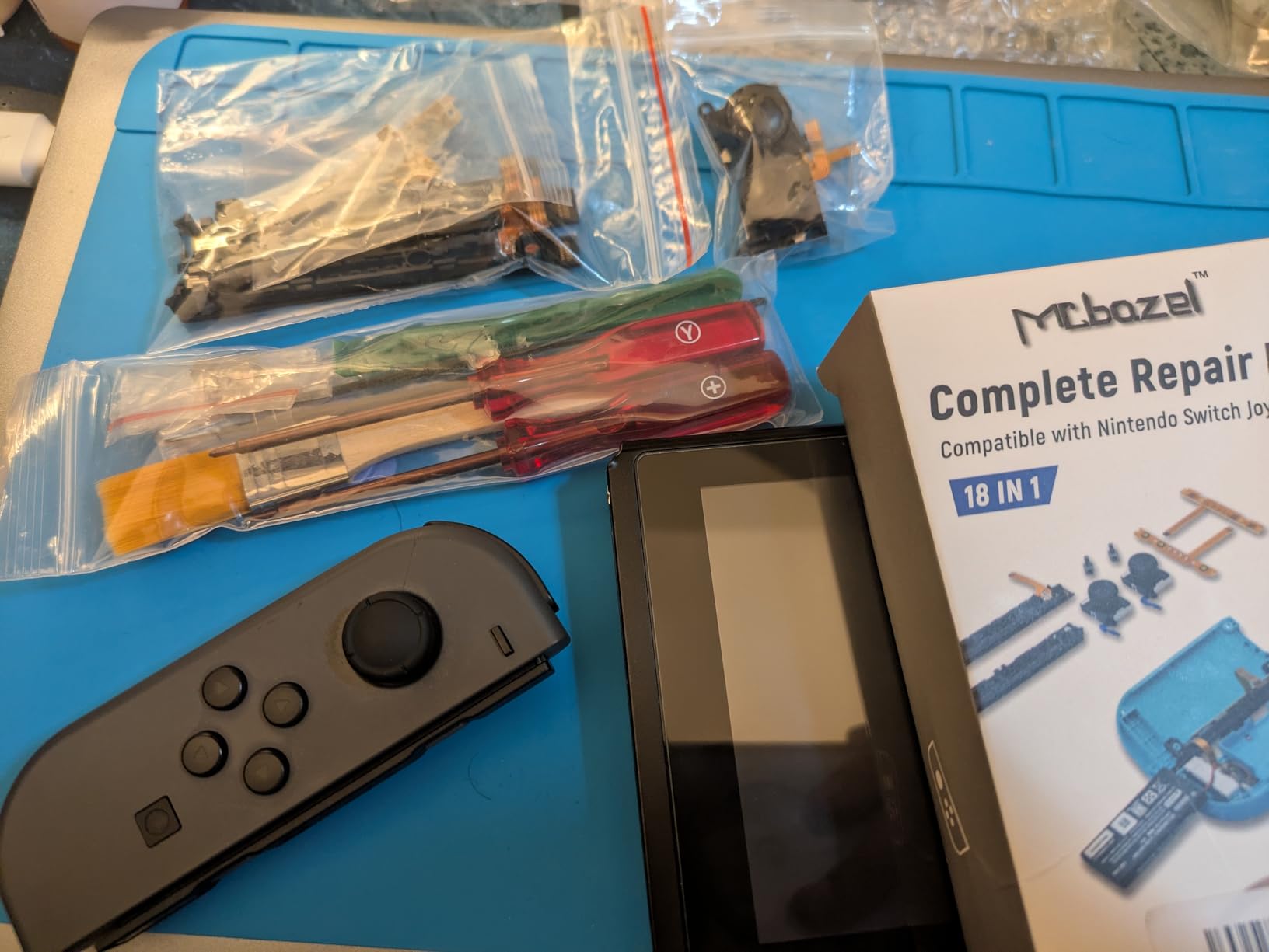 Mcbazel 18 in 1 Replacement Repair Kit for N-Switch Joy-Con with Screwdrivers Opening Tool, 3D Left Right Analog Joysticks, Buckle Lock, Charging Port Slider, Button Sync Flex Cable Set (NOT for Switch 2) customer photo 1