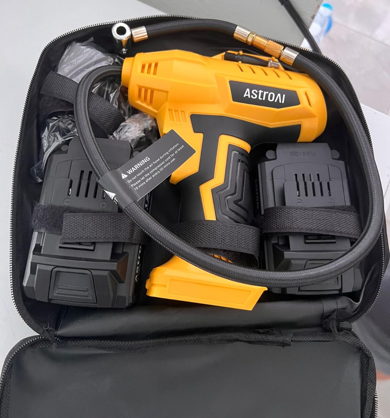 AstroAI Cordless Tire Inflator Air Compressor 20V Rechargeable Battery Powered 160PSI Portable Air Pump with 12V Car Power Adapter Digital Pressure Gauge for Cars Motorcycles JY16P160-18（C2）Yellow customer photo 1