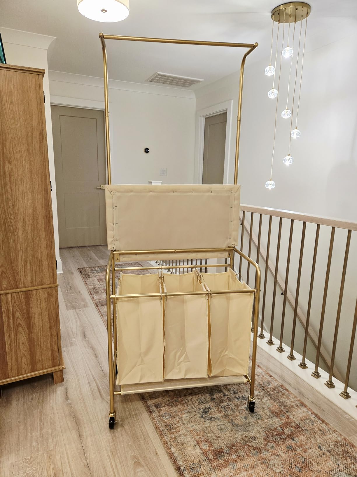 MYOYAY 3 Section Laundry Sorter with Garment Hanging Bar Rack Foldable Ironing Board, Laundry Basket Organizer Heavy Duty Laundry Hamper Rolling Cart with Lockable Wheels and 3 Removable Bags customer photo 2