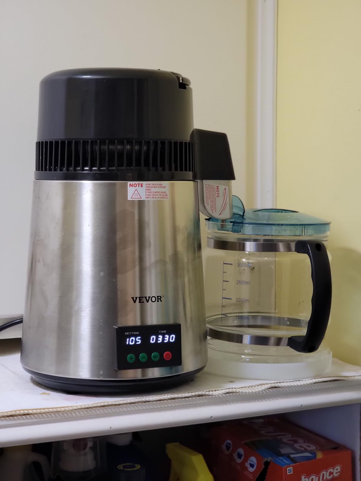 VEVOR 1.1 Gal Water Distiller, 0.3 Gal/H, Distilled Water Maker Machine 750W 0-99H Timing Set Temp Display, 304 Stainless Steel Countertop Distiller Glass Carafe Cleaning Powder 3 Carbon Packs, Silver customer photo 2