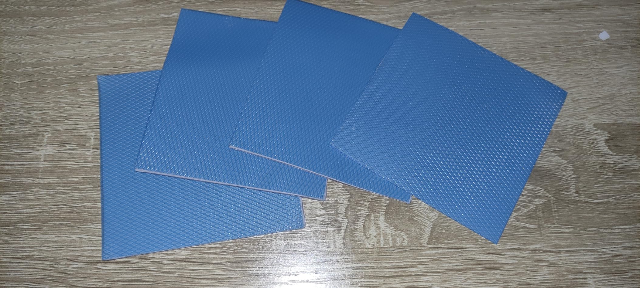 Aairhut 4 Pack 13 W/m.K Thermal Pads, 100 x 100 mm x [0.5 mm+1 mm+1.5 mm+2 mm] Silicone Cooling Pad Non Conductive Heat Resistance Extreme Odyssey Cover with Dual Self-Adhesive Films for PC Laptop PS4 customer photo 1