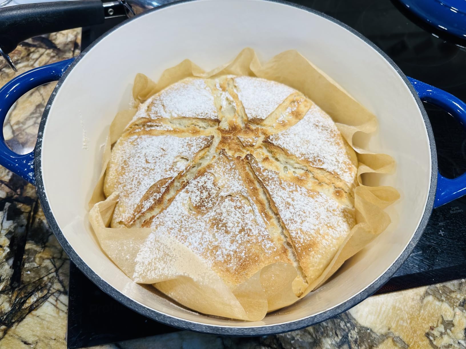 Nuovva Enamelled Cast Iron Dutch Oven Pot with Lid - 6.4 Quart Non Stick Casserole Pot - Heavy Duty & Oven Safe up to 500 F for Bread Baking, Braising, Stews, Roasting (28cm Dark Blue) customer photo 1