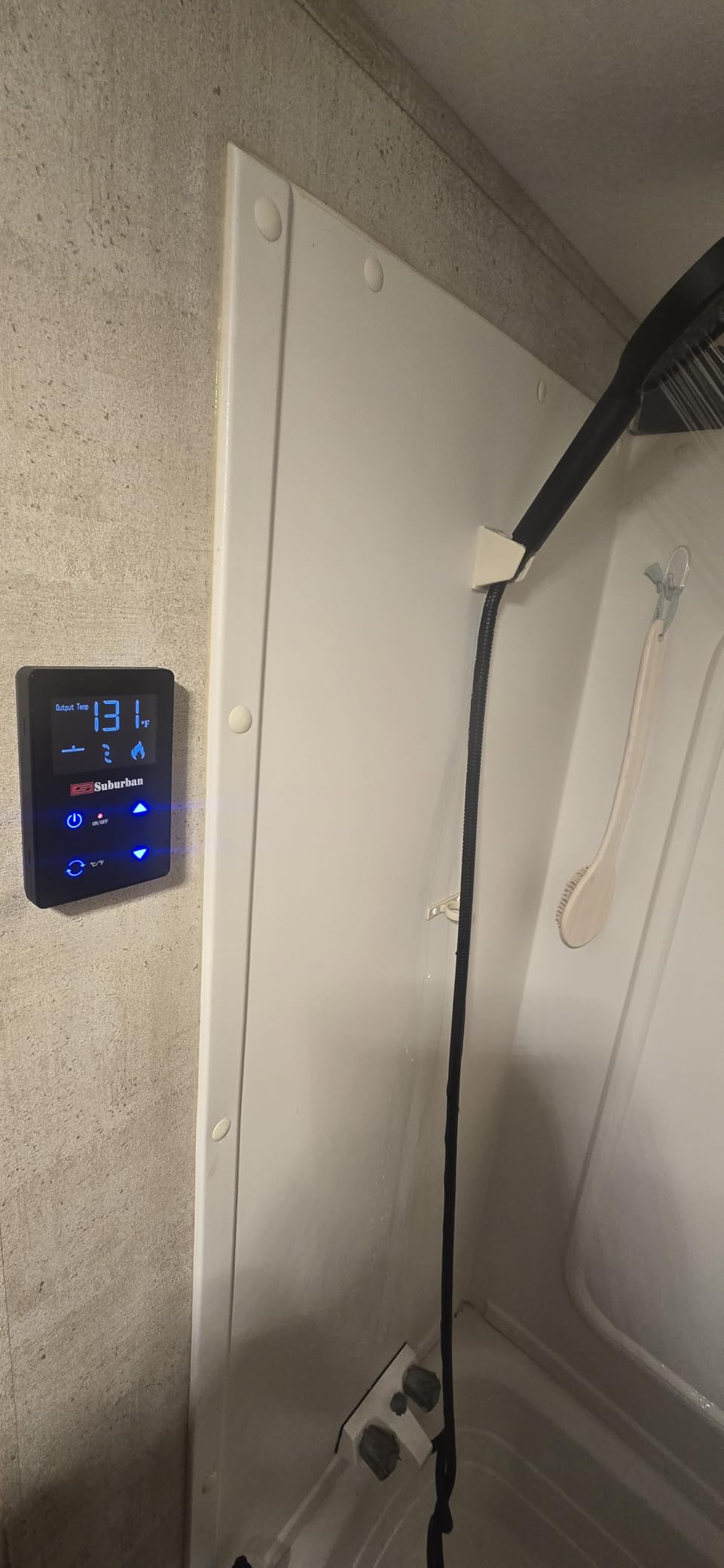 Suburban ST-60 60,000 BTU RV Tankless Water Heater, Freeze Protection | Endless hot water on demand. Digital controls; flame-out protection; freeze guard and energy-saving design for RVs. customer photo 1