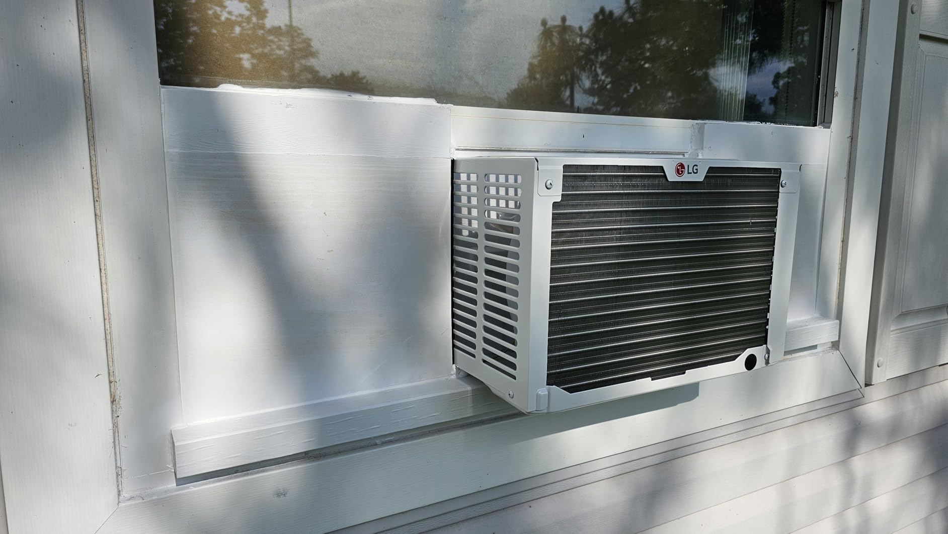 LG 8,000 Window Air Conditioner, 115V, 350 Sq.Ft. (14' x 25' Room Size), Quiet Operation, Electronic Control with Remote, 3 Cooling & Fan Speeds, Auto Restart, 8000 BTU, White | 115V, Remote Control, 3 Cooling and Fan Speeds, Auto-Restart, Electronic Controls, Quiet Operation, Rooms up to 350 Sq.Ft. customer photo 1