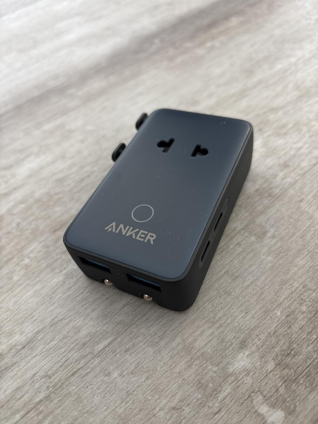 Anker Nano Travel Adapter, 5-Port Power Adapter with 1x 2-Pin AC, 2 USB A, 2 USB C for 20W, Smart Temperature Control, Works in 200+ Countries, Not a Voltage Converter, Travel Essentials (1-Pack) customer photo 1