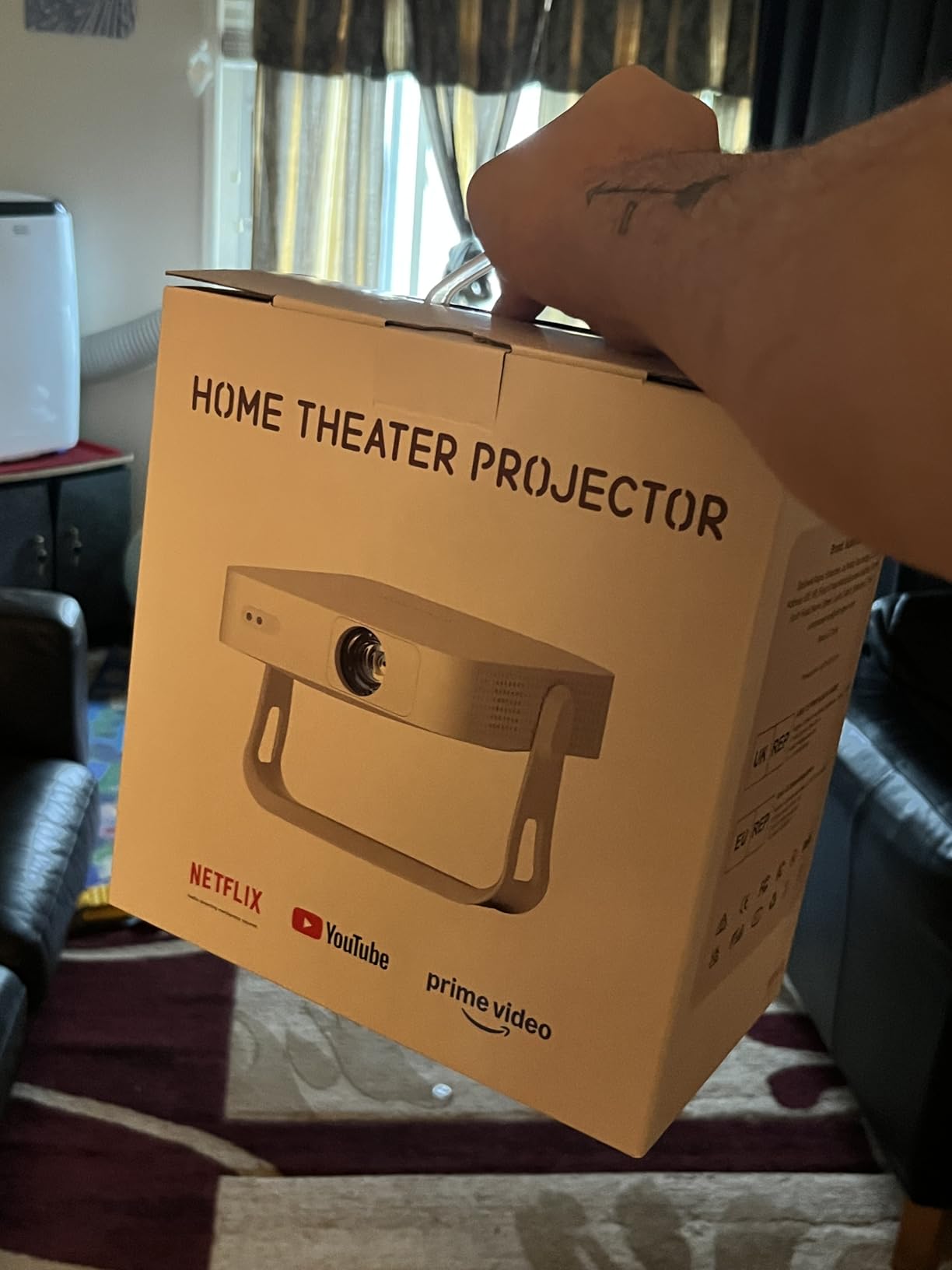 XuanPad 4K Support Movie Projector, Officially-Licensed App & Auto Focus, White Smart Mini Projector with WiFi and Bluetooth, Portable Native 1080P Outdoor Projector with 360° Stand customer photo 1