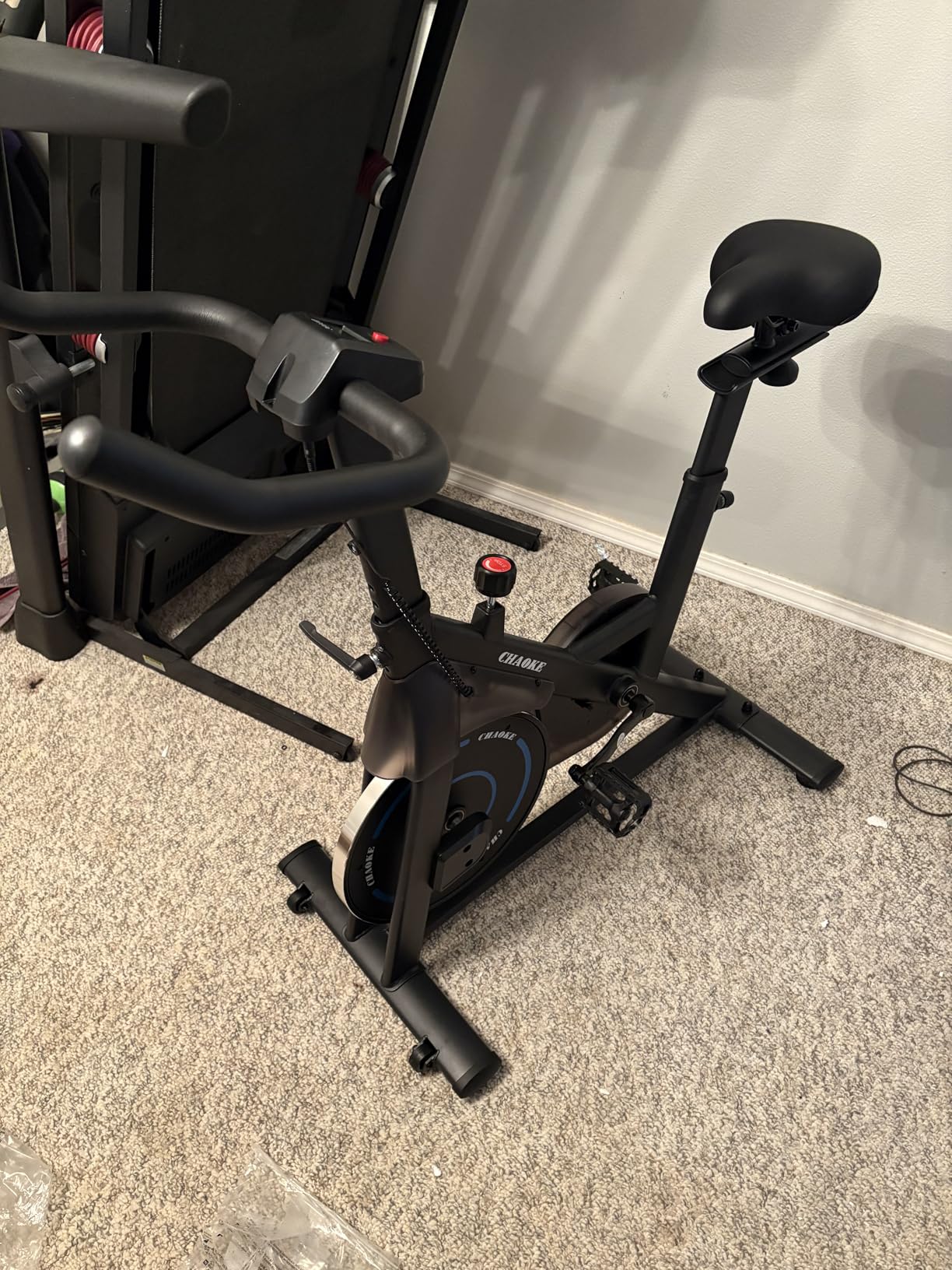 CHAOKE Exercise Bike, Quiet Adjustable Magnetic Stationary Bike for Home Cardio with App Compatible, 350LB Weight Capacity Indoor Cycling Bike with Large Seat, Dumbbell Rack, Pull Cords & LCD Display customer photo 1