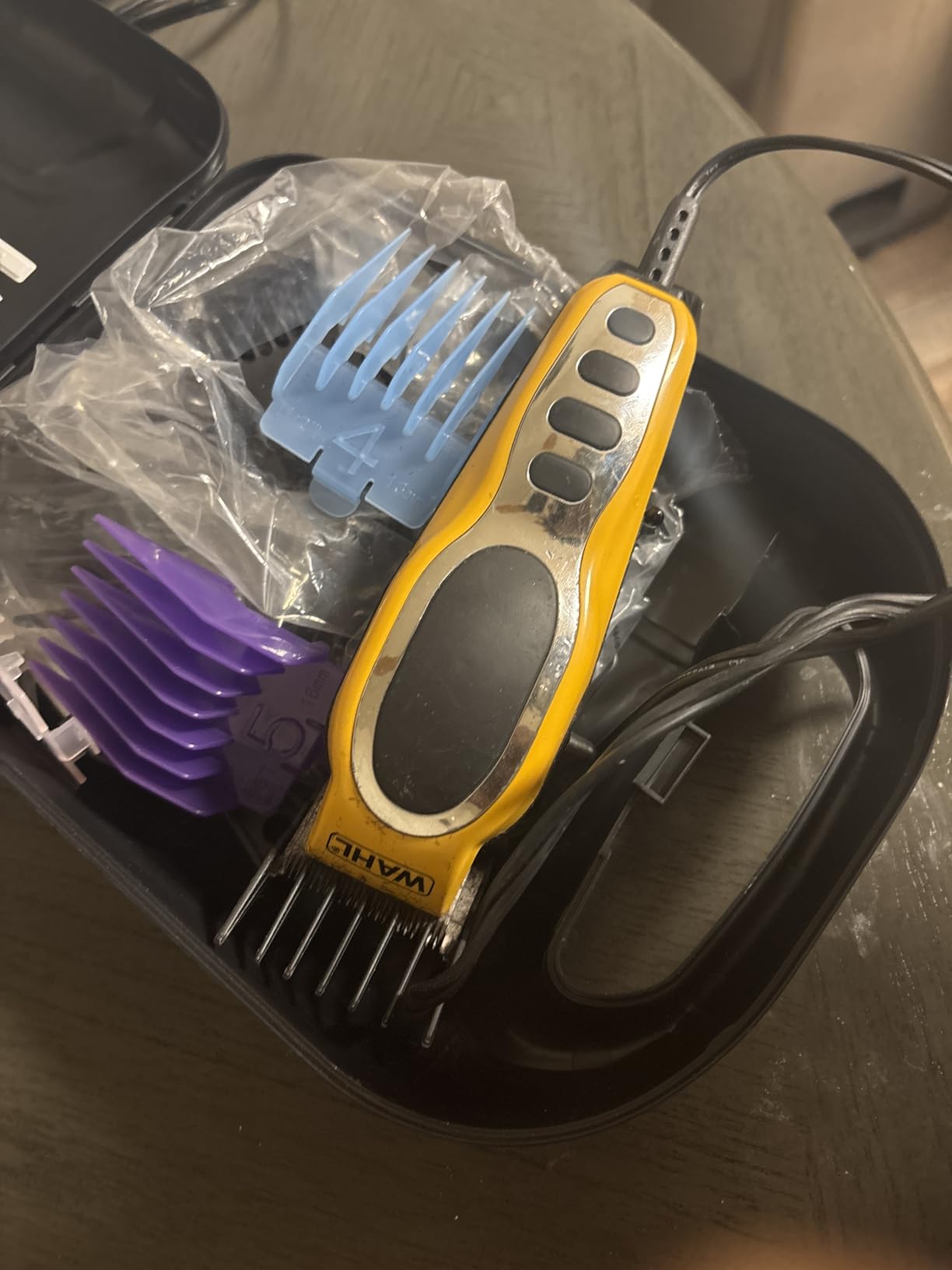 Wahl Clipper USA Color Pro Complete Haircutting Kit with Easy Color Coded Guide Combs - Corded Clipper for Hair Clipping & Grooming Men, Women, & Children - Model 79300-1001M customer photo 1