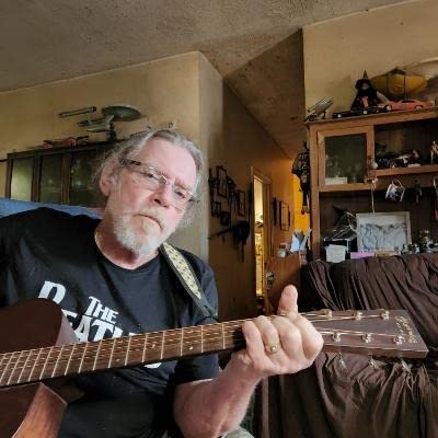 Martin Guitar 000-15M with Gig Bag, Acoustic Guitar for the Working Musician, Mahogany Construction, Satin Finish, 000-14 Fret, and Low Oval Neck Shape customer photo 1