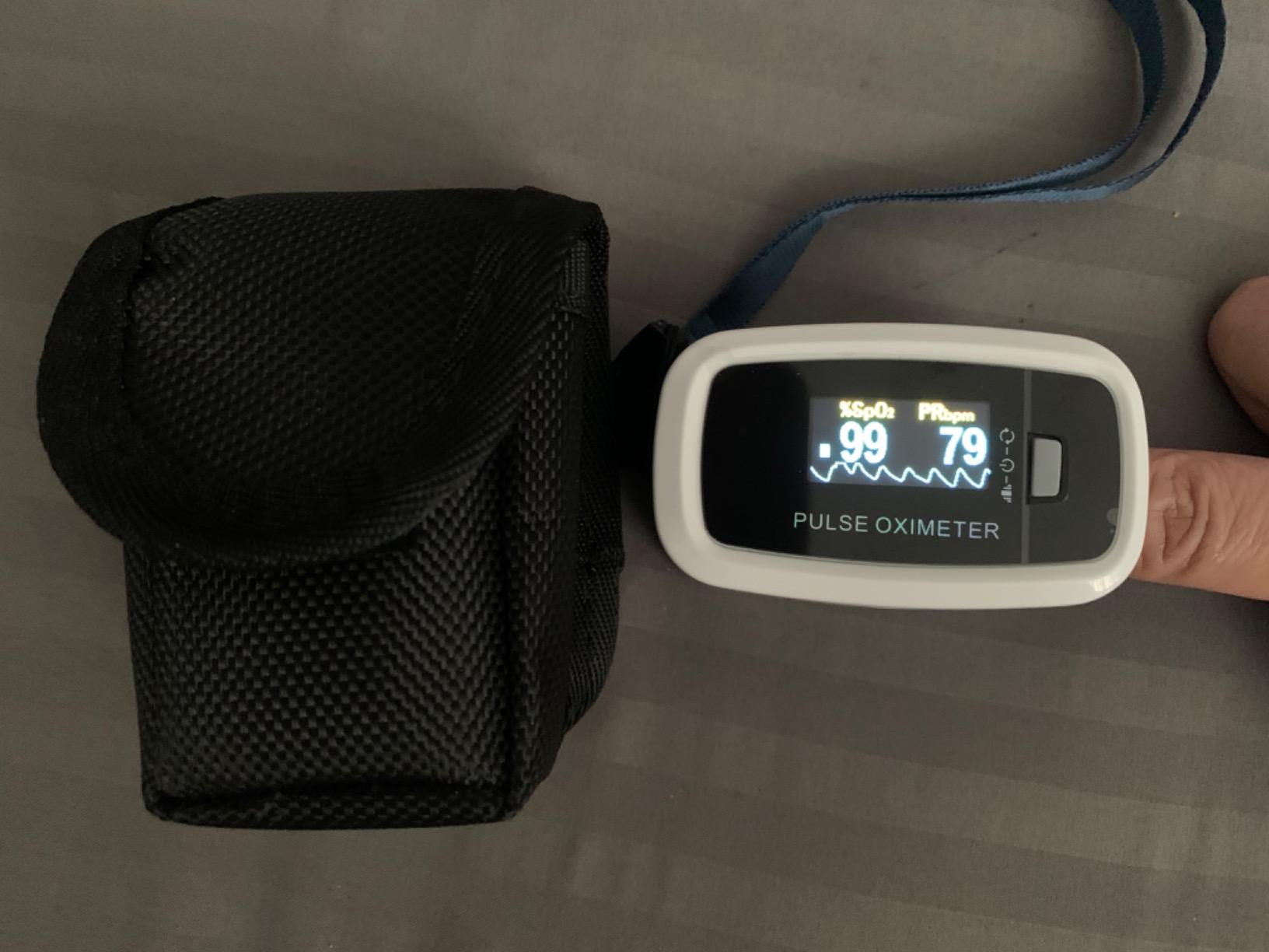 AccuMed CMS-50D1 Fingertip Pulse Oximeter Blood Oxygen Sensor SpO2 for Sports and Aviation. Portable and Lightweight with LED Display, 2 AAA Batteries, Lanyard and Travel Case (White) customer photo 1