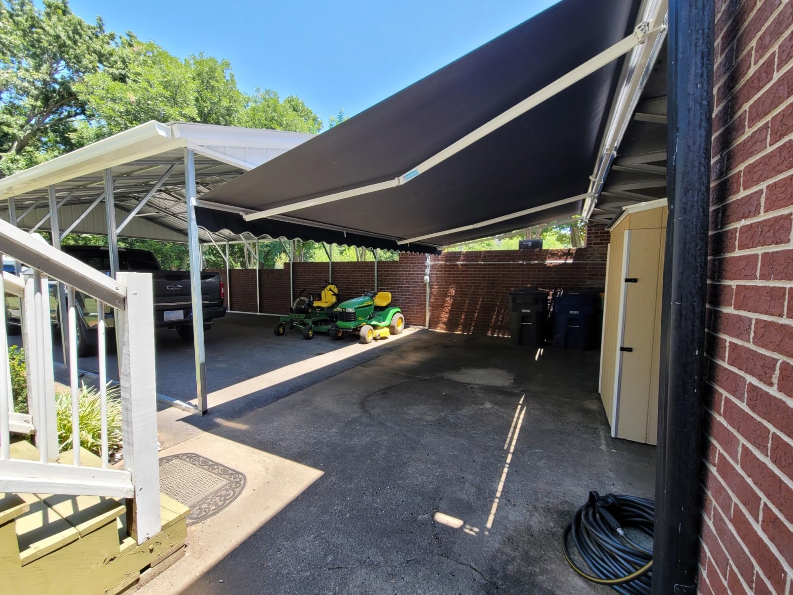 Aleko 16x10 feet Caribbean Style Electric White Frame Awning, Remote Control Motorized & Manual Crank, Outdoor Shade Canopy with UV-Resistant Fabric - Charcoal Gray customer photo 1