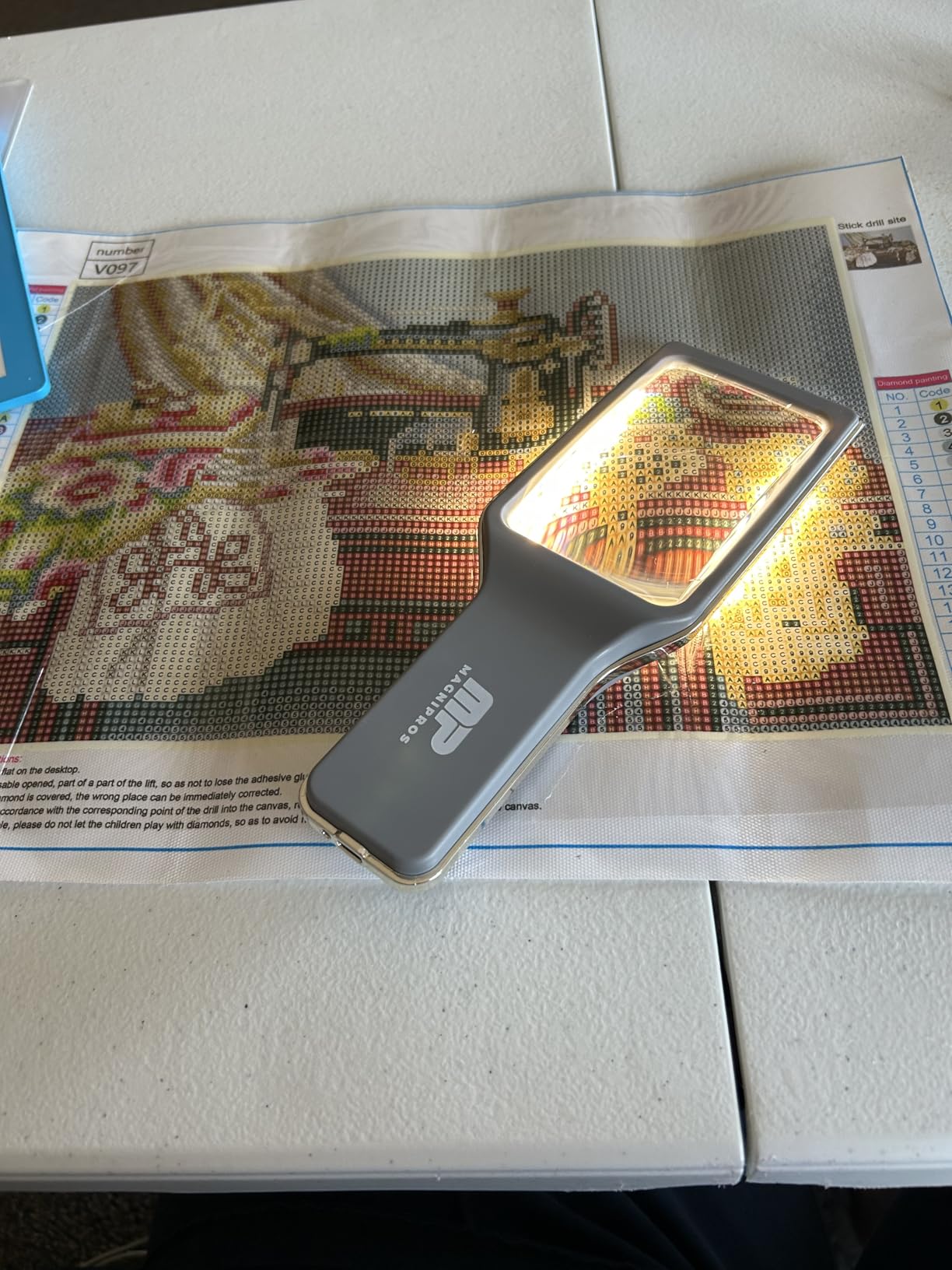 MagniPros Patented 6X Rechargeable Magnifying Glass with 3 Color Light Modes & Anti-Glare Lens - Relieve Eye Strain | Perfect for Low Vision Seniors, Macular Degeneration & Fine Print customer photo 1