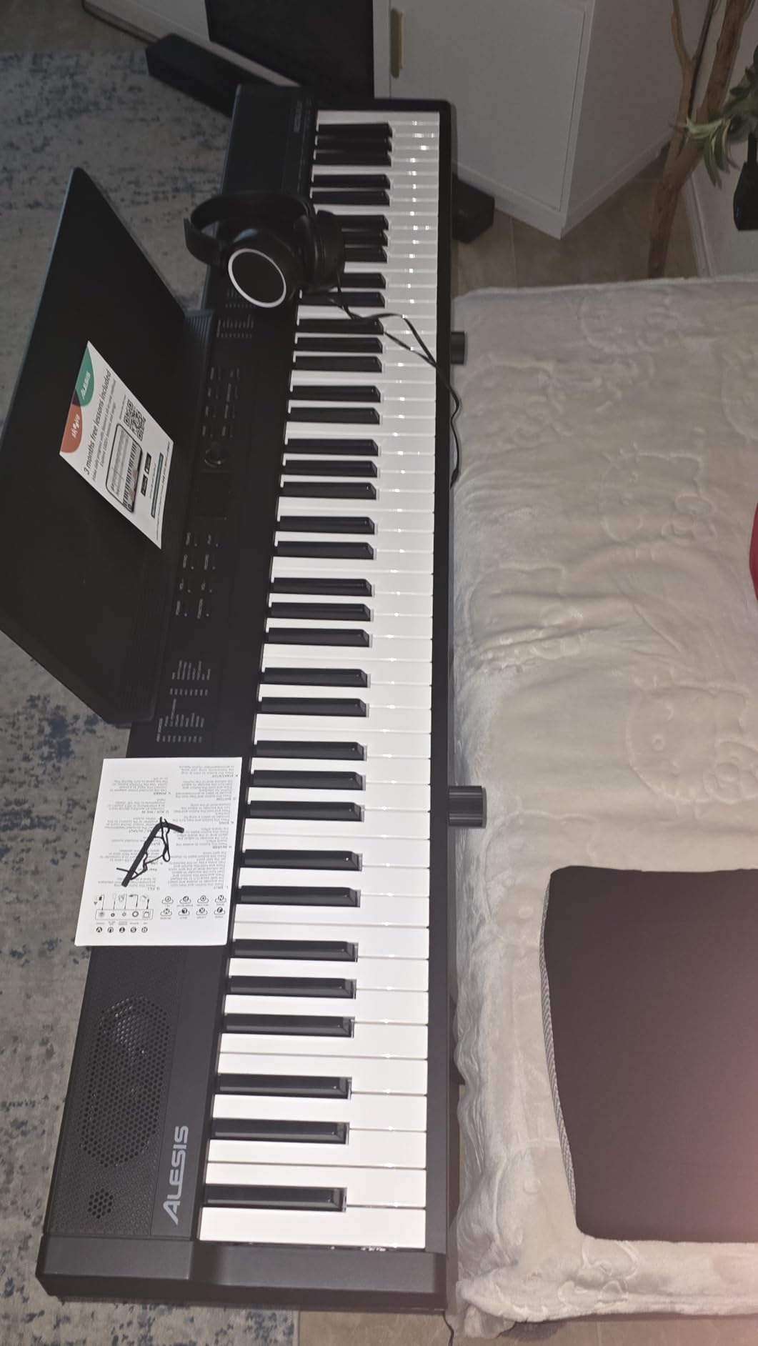 Alesis 88 Key Keyboard Piano with 480 Sounds, Speakers, USB MIDI, Carry-Bag, Stand, Headphones, Pedal and Piano Lessons for Beginners customer photo 1