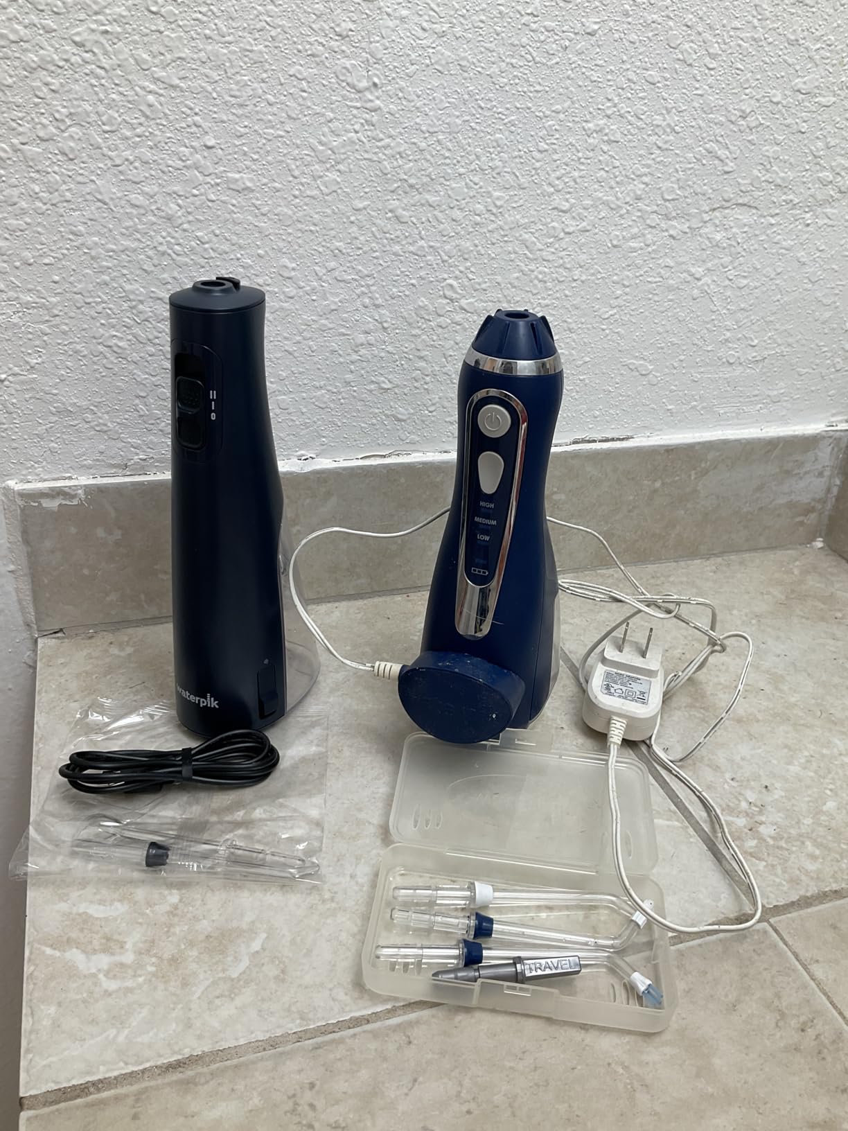 Waterpik Cordless Pulse 3100 Rechargeable Portable Water Flosser for Teeth, Gums, Braces Care and Travel with 2 Flossing Tips, Waterproof for Shower Use, ADA Accepted, WF-20 White customer photo 2