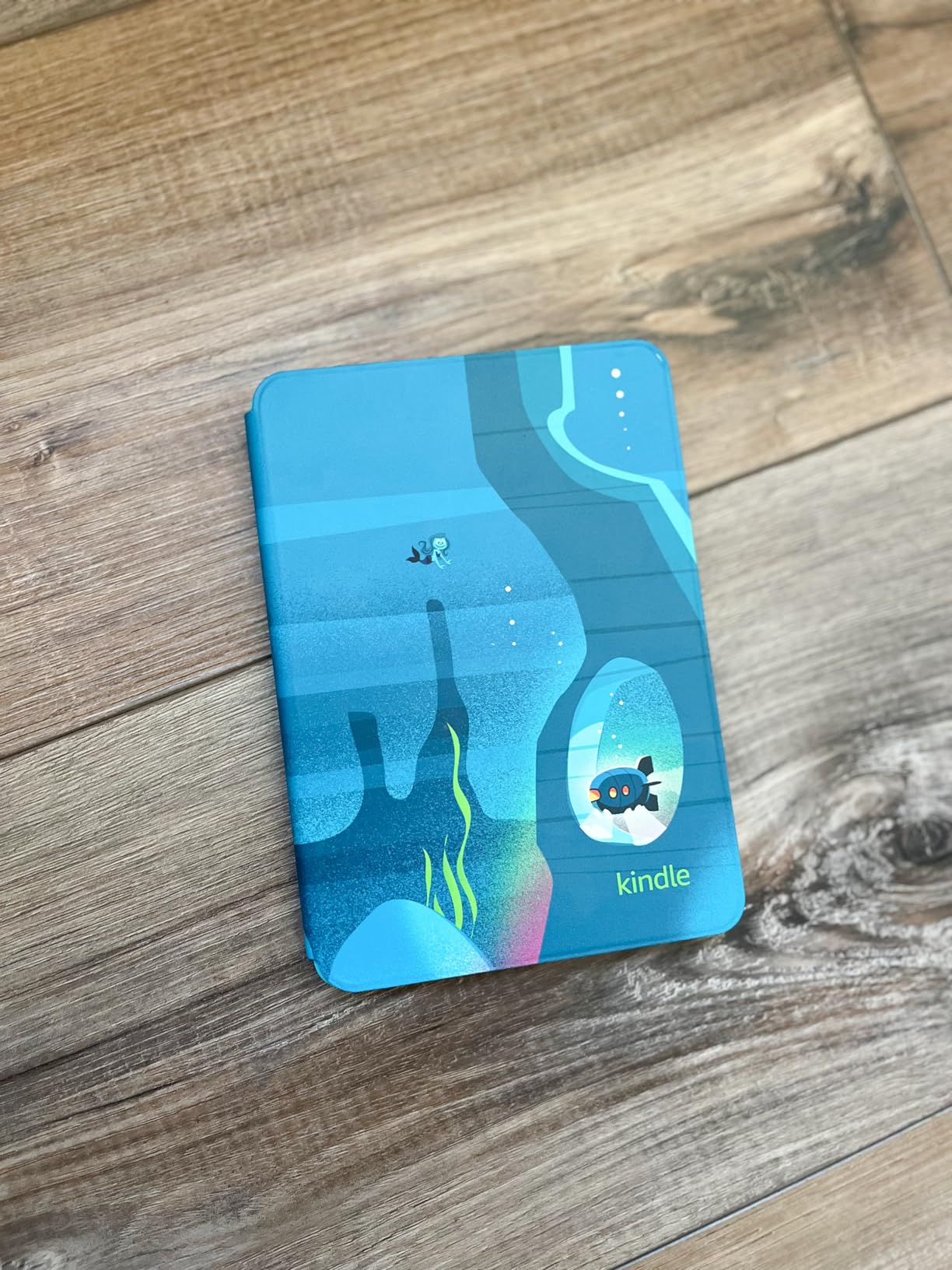 Kindle Kids 16GB (newest model) - If it breaks, we will replace it, includes ad-free books and cover, with glare-free display, faster page turns - Ocean Explorer customer photo 2