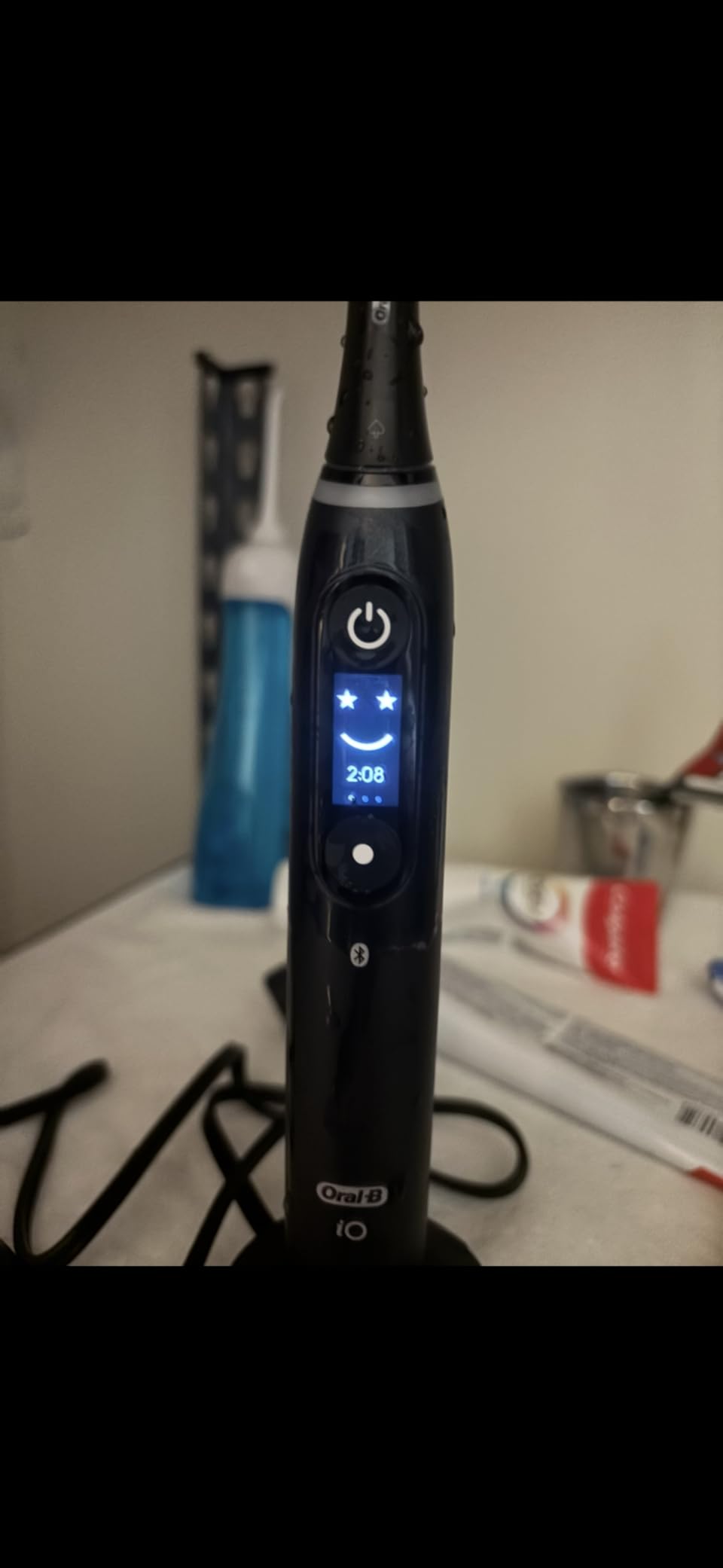 Oral-B iO Deep Clean + Protect Rechargeable Electric Toothbrush, Black, iO Series 7, 2 Replacement Brush Heads, Charging Travel Case customer photo 1