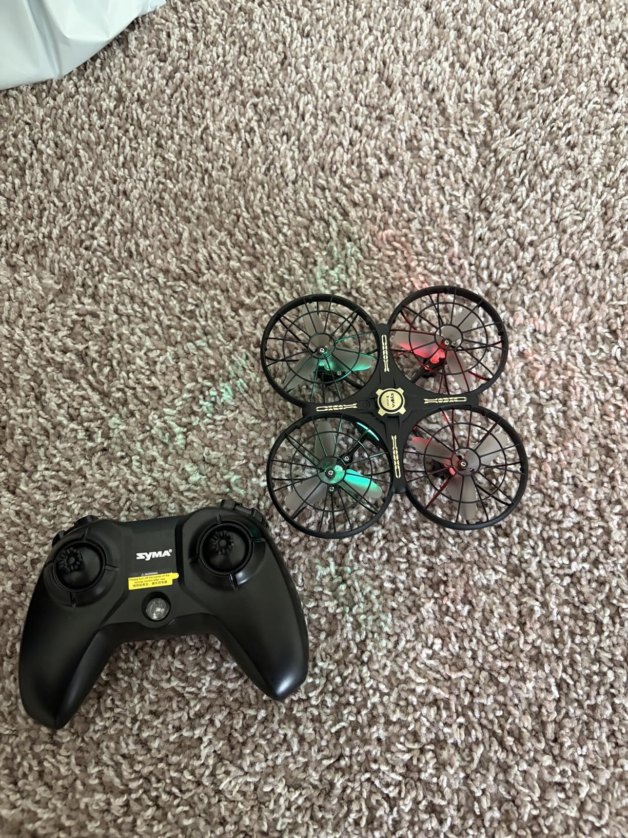 SYMA X100 Drone for Kids 8-12, Automatic Obstacle Avoidance, Up to 20 Mins Flight Time(2 Batteries), One-Key 360°Flips and Altitude Hold, Full-Guard Safe Indoor Drone Gift for Boys & Girls customer photo 1