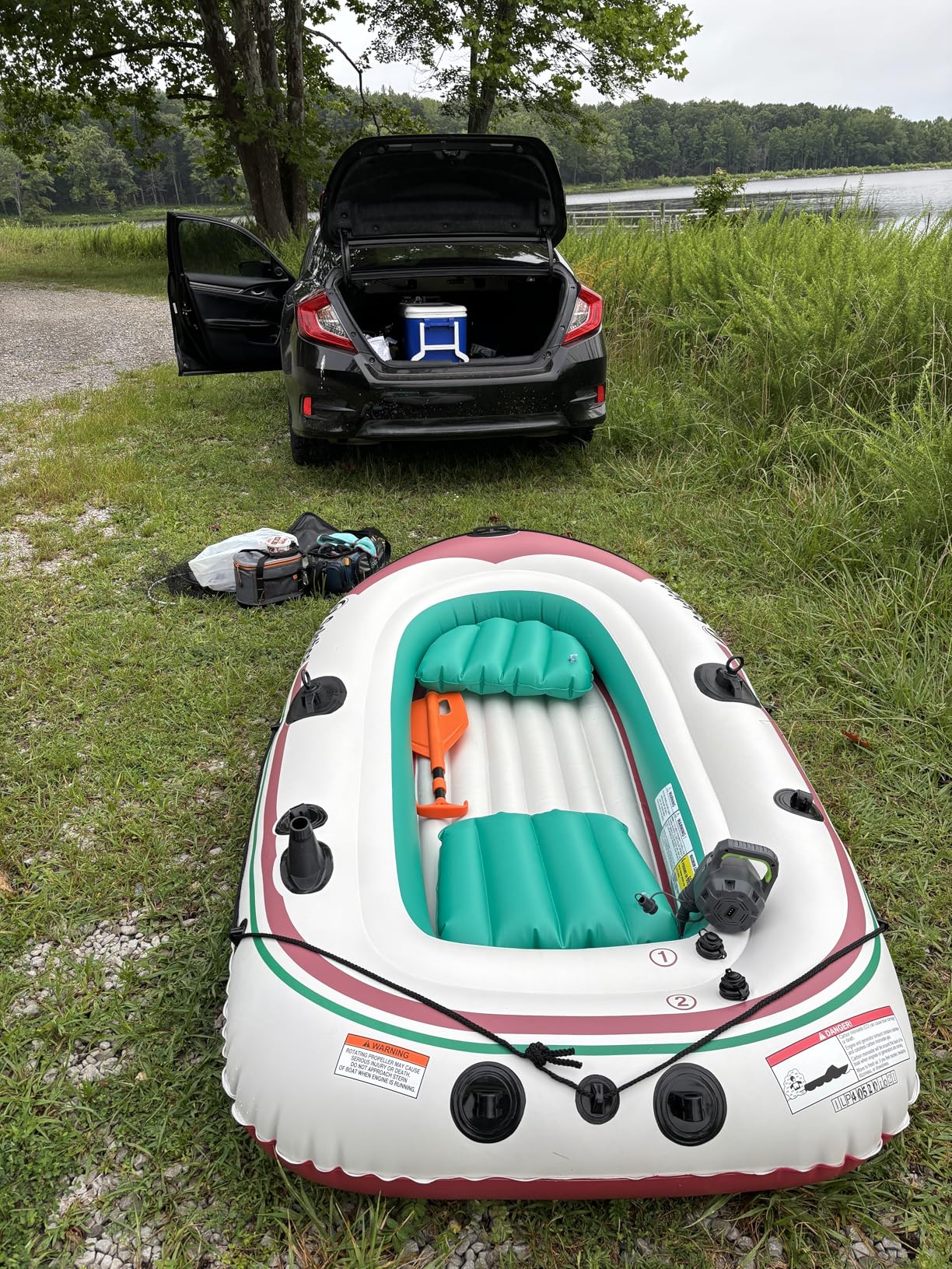 Solstice Voyager 4-Person Inflatable Fishing Boat with Dual Swivel Oar Locks and Rod Holder, Motor Compatible 9' x 5' customer photo 1