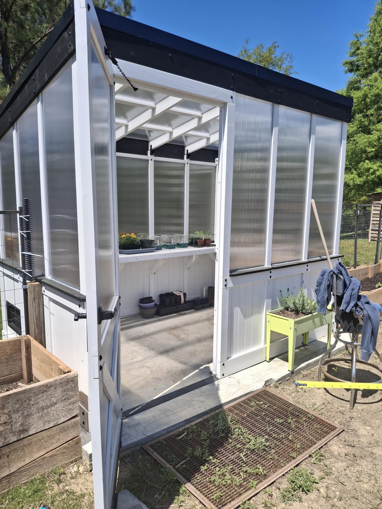 Backyard Discovery Zalie 11' x 7' Cedar Wood and Polycarbonate Walk-in Greenhouse Kit with Exhaust Fan, Windows, Hose Hook-Ups, PowerPort, Staging Shelves for Year-Round Outdoor Gardening customer photo 1