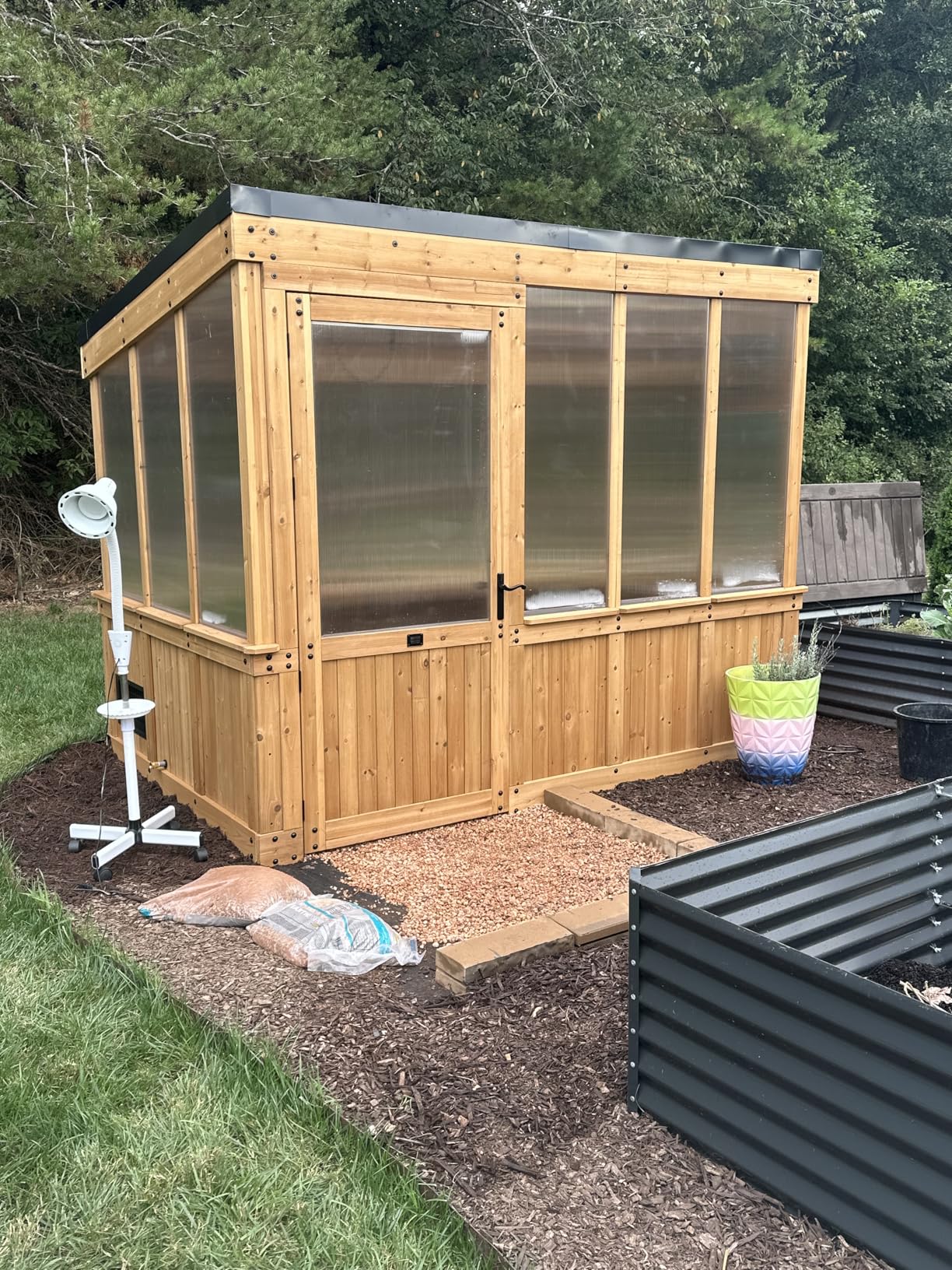 Backyard Discovery Zalie 11' x 7' Cedar Wood and Polycarbonate Walk-in Greenhouse Kit with Exhaust Fan, Windows, Hose Hook-Ups, PowerPort, Staging Shelves for Year-Round Outdoor Gardening customer photo 2
