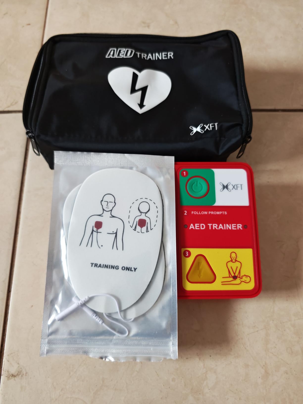 XFT AED Trainer & AED Simulator & AED Defibrillator for Home, Lightweight CPR Practice Device, Portable Defibrillator Training for First Aid Beginners (XFT-120N) customer photo 1