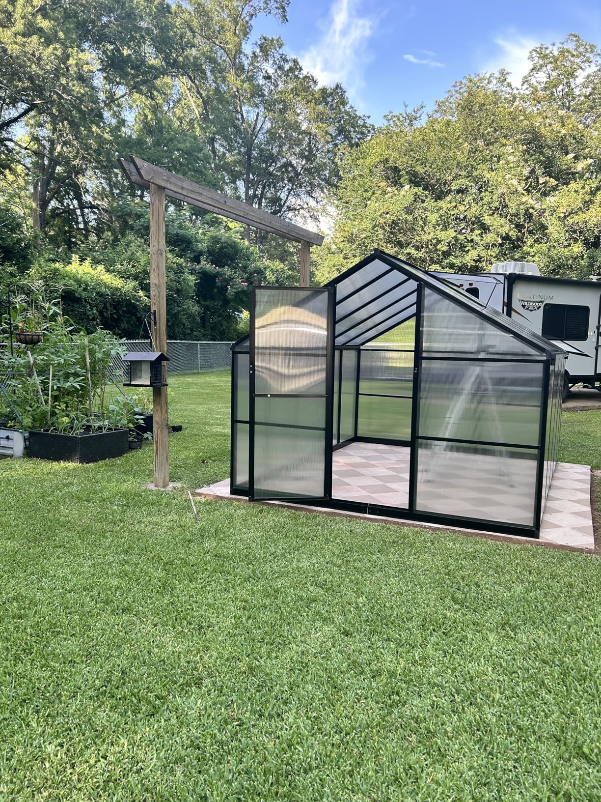 6x10 FT Greenhouse for Outdoors, Polycarbonate Greenhouse with Roof Vent, Ground Nails, Lockable Push Door, Aluminum Large Walk-in Green House for Outside Garden Backyard, Patio, Lawn, Black customer photo 1