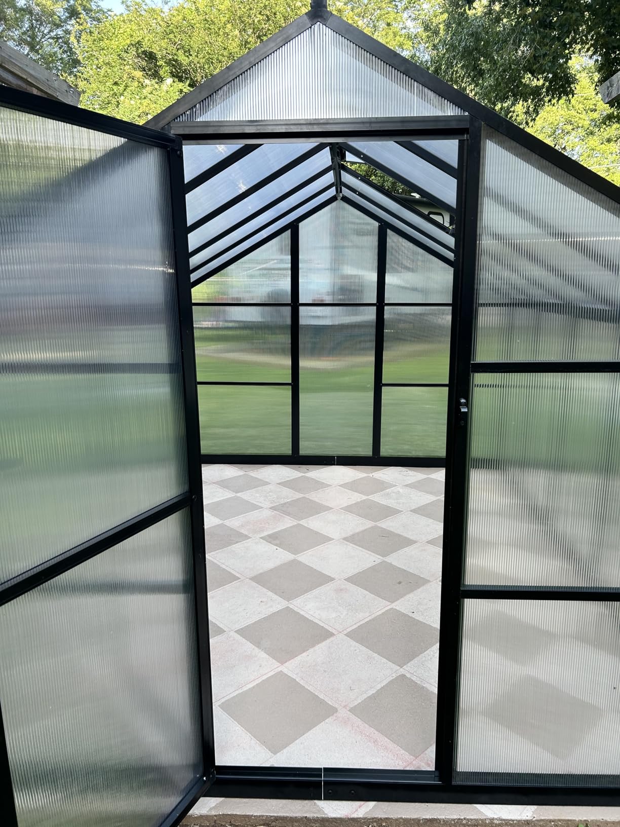 6x10 FT Greenhouse for Outdoors, Polycarbonate Greenhouse with Roof Vent, Ground Nails, Lockable Push Door, Aluminum Large Walk-in Green House for Outside Garden Backyard, Patio, Lawn, Black customer photo 2