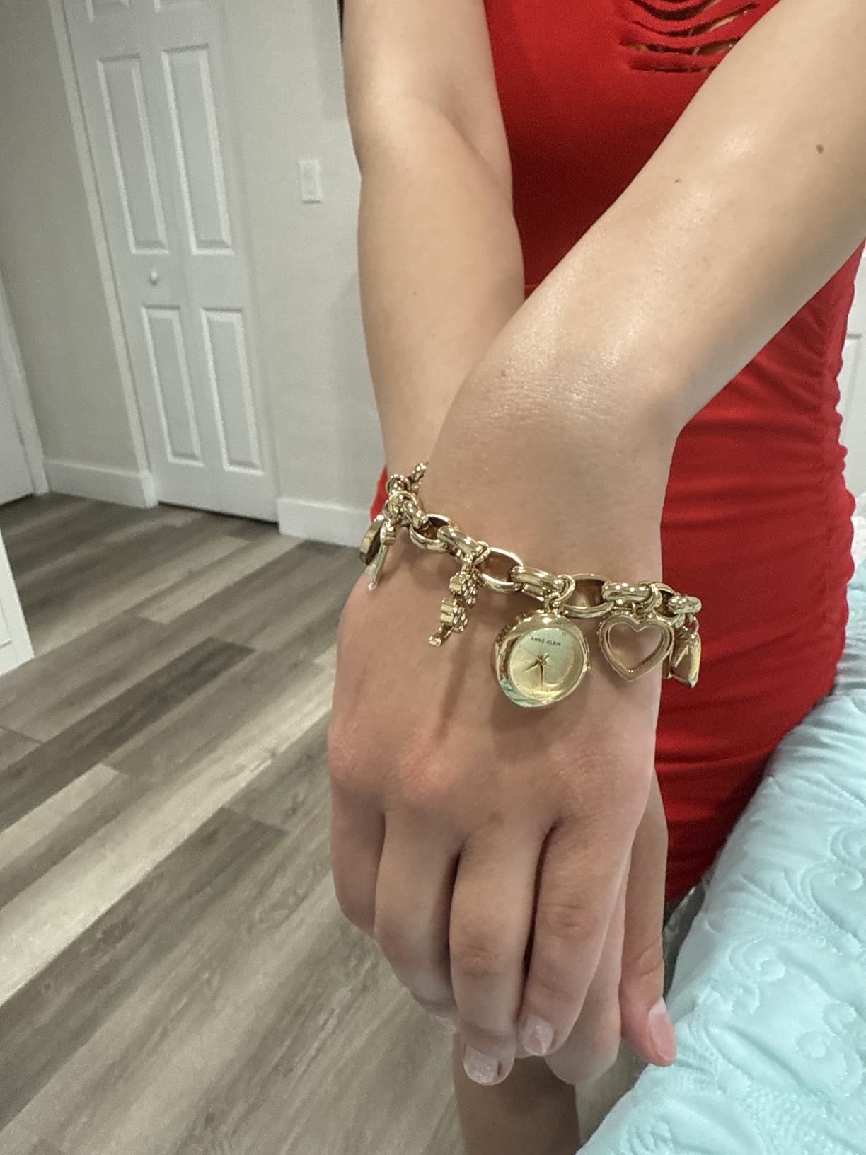 Anne Klein Women's Premium Crystal Accented Gold-Tone Charm Bracelet Watch, 10/7604CHRM customer photo 1