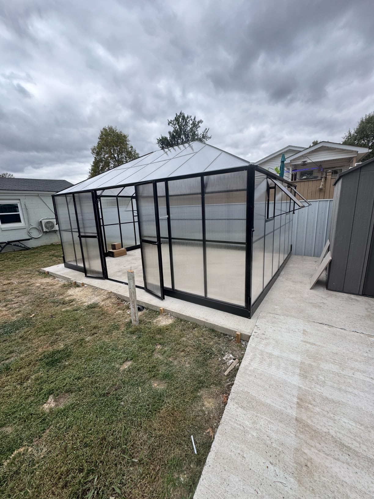Jocisland 16x12x9.5 FT Polycarbonate Greenhouse - 6 FT Wall Height Outdoor Aluminum Greenhouses with 2 Ventilation and Rain Gutter, Double Doors with Hook, Walk-in Greenhouse for Backyard Garden customer photo 1