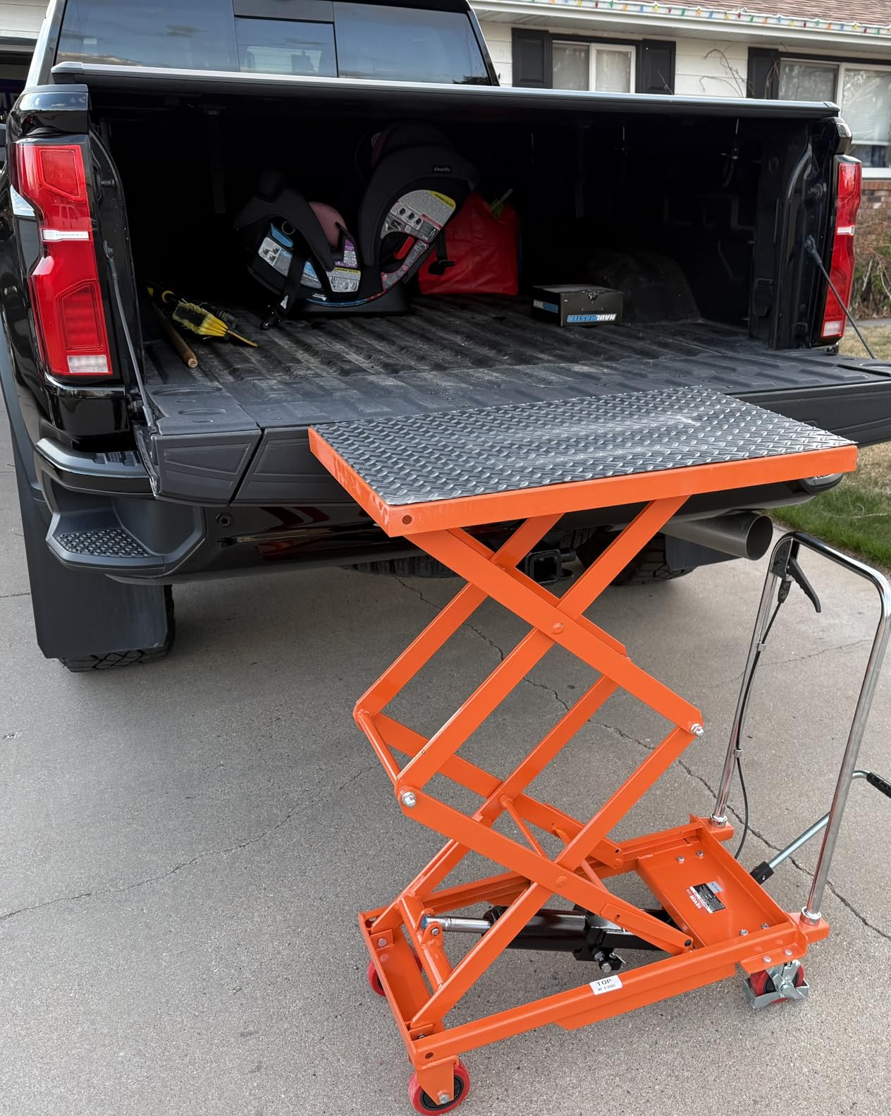 VEVOR Hydraulic Lift Table Cart, 330 lbs Load Capacity, 50-Inch Lifting Height, Manual Single Scissor Lift Table with Non-Slip Pad and 4 Wheels, Orange, Alloy Steel customer photo 1