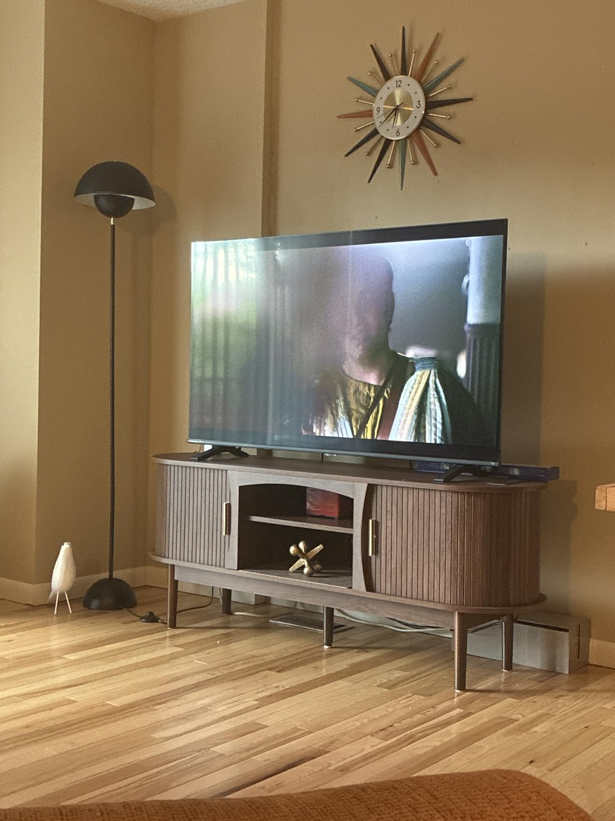 Decofy Mid Century TV Stand for TVs up to 80 Inches, Entertainment Center with Storage, Power Outlet, Fluted Sliding Doors & Adjustable Shelves, Modern Media TV Console Table for Living Room (Walnut) customer photo 1