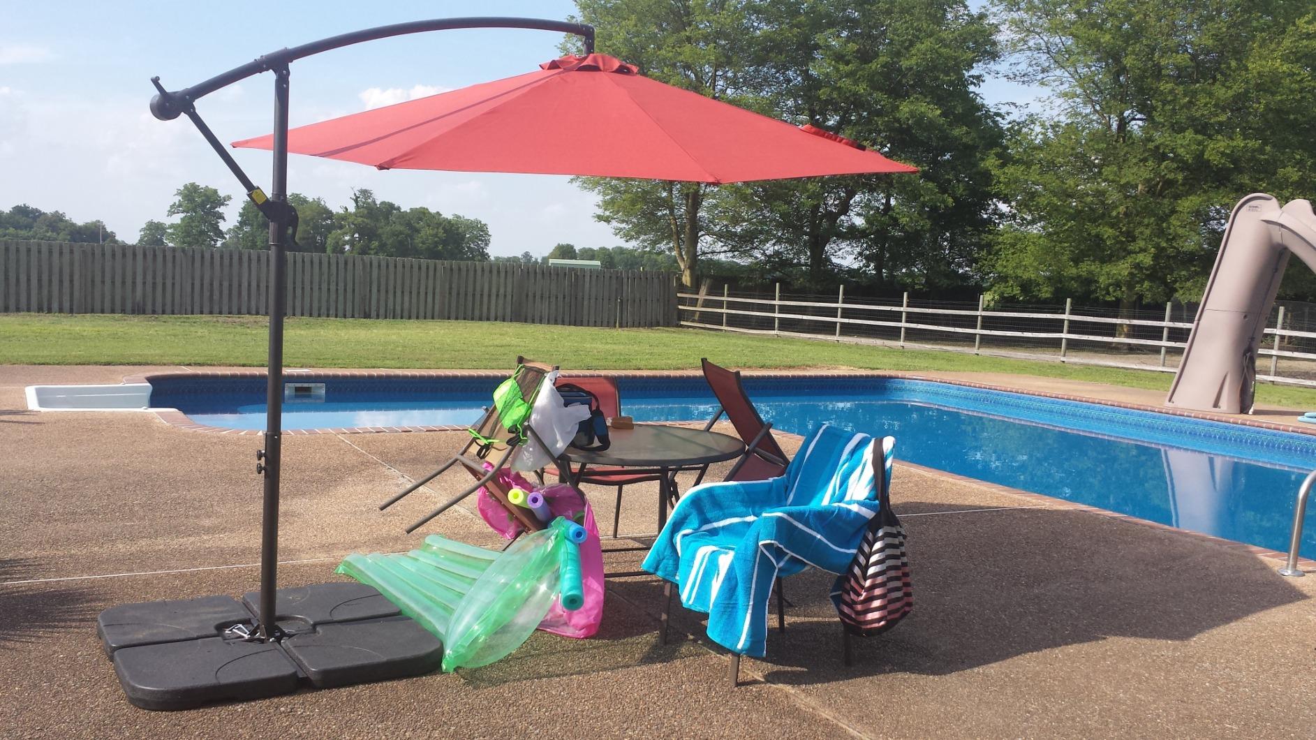wikiwiki 10ft Solar LED Patio Umbrella with Base Included, Offset Umbrella with Weighted Sandbag Base, Cantilever Patio Umbrellas for Backyard, Garden & Deck, 32 LED Lights & Polyester Shade, Beige customer photo 2