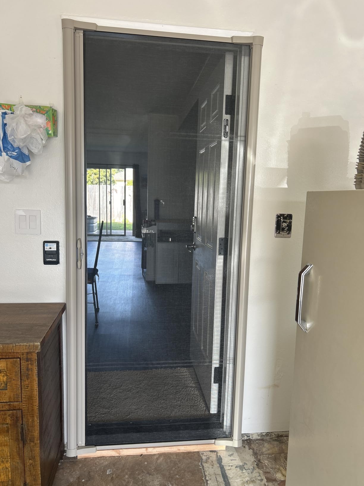 LARSON Brisa Single Brown Retractable Screen Door with Thin Mesh Screen for High Visibility, Fits 80-in to 81-in Tall x 32-in to 36-in Wide Front Doors customer photo 1