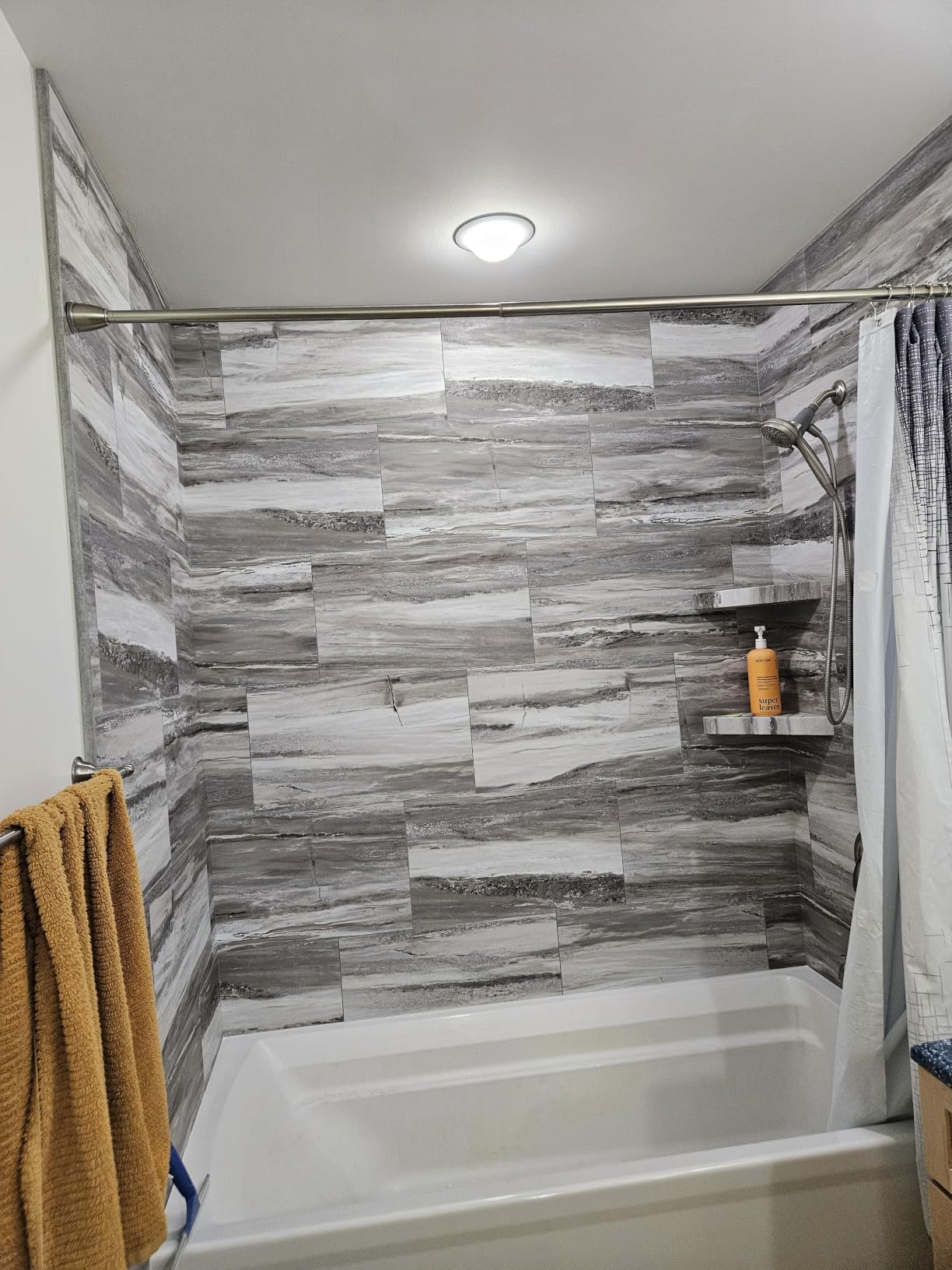 Palisade 25.6 in. x 14.8 in. Vinyl Tile Surround Kit in Carrara Marble | Interlocking waterproof tile surround for kitchen or bathroom customer photo 1