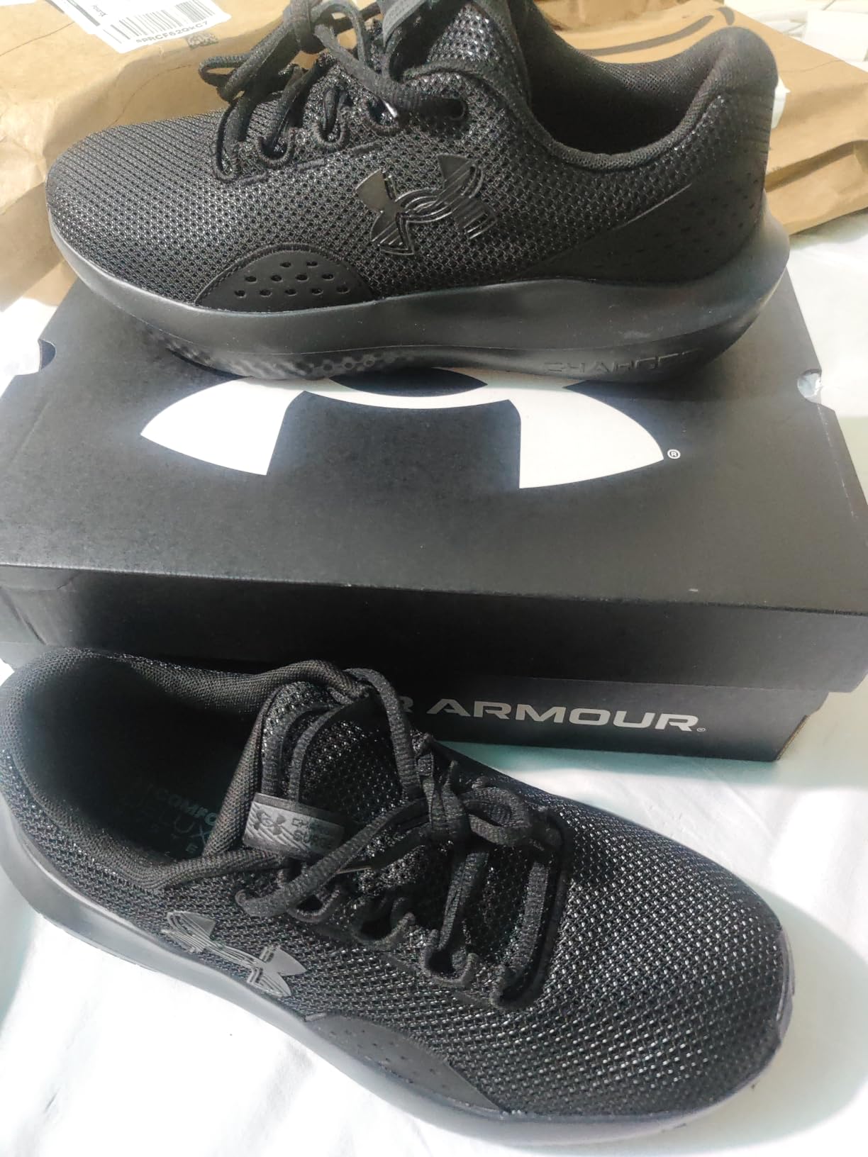 Under Armour Men's Charged Surge 4 Sneaker customer photo 2