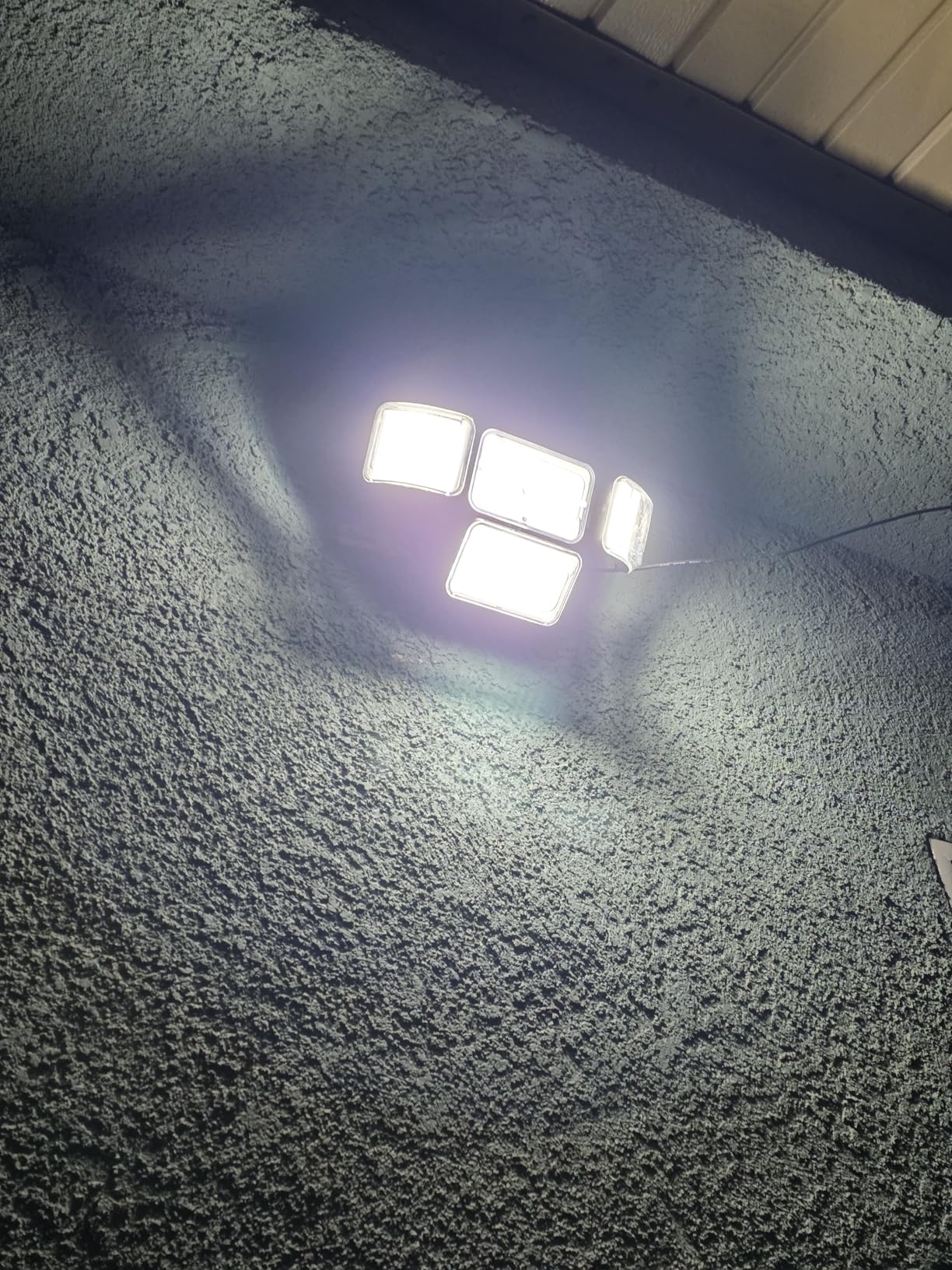 CLAONER Solar Outdoor Lights Motion Sensor 3500LM 288 LED Solar Security Lights with Remote Control IP67 Waterproof 4 Heads Solar Flood Lights with 16.4ft Cable 4 Modes Wall Lights (2 Pack) customer photo 1