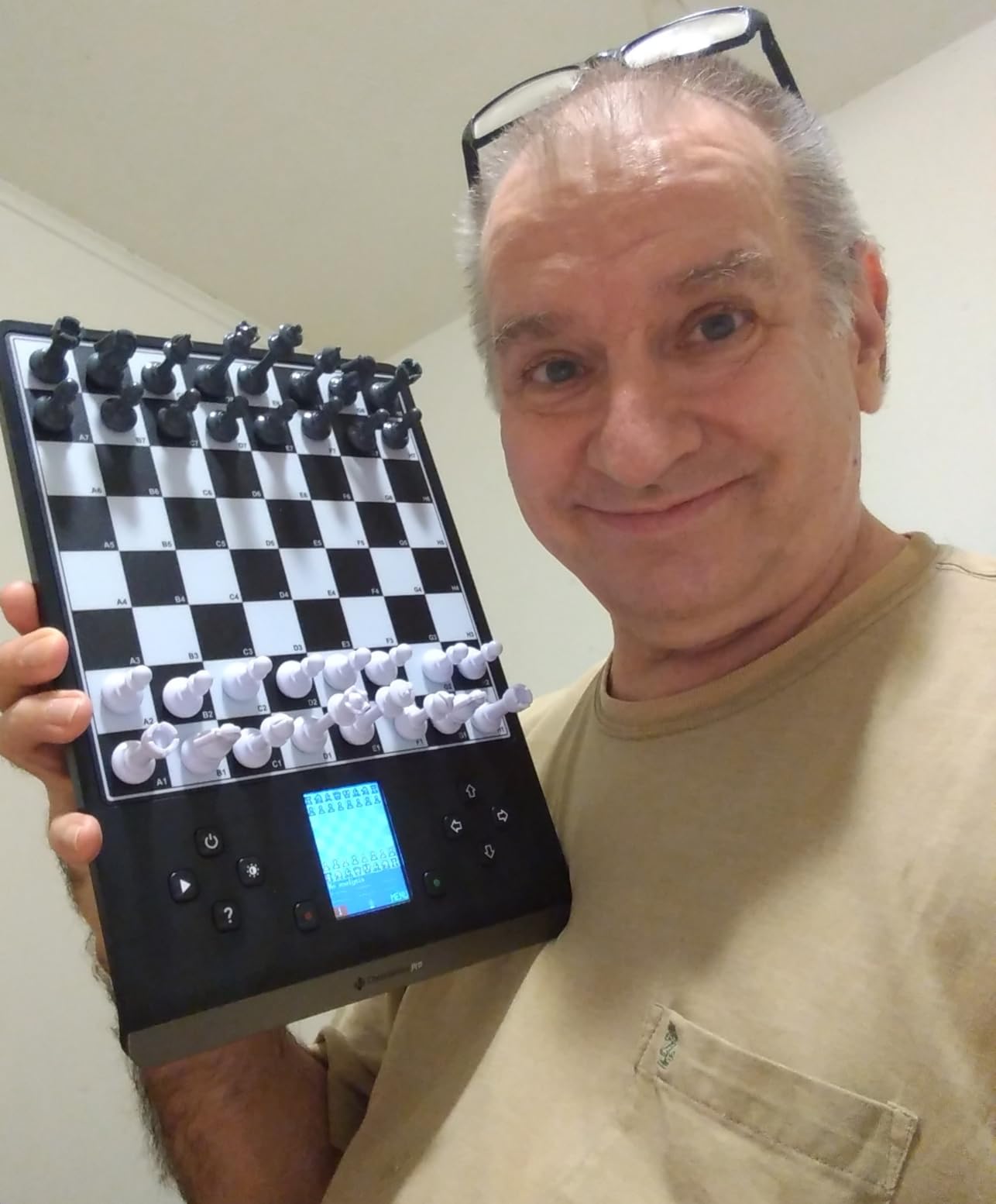 Millennium ChessGenius Pro M815 - Electronic Chess Computer with 2200 ELO Adaptive AI Skill Levels, Color Display, Built-in Trainer, Magnetic Travel Design customer photo 1